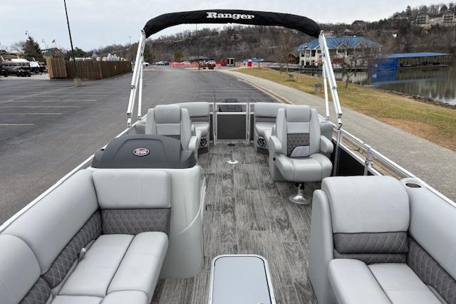 2025 Ranger Reata 243C pontoon boat with spacious seating and modern design.