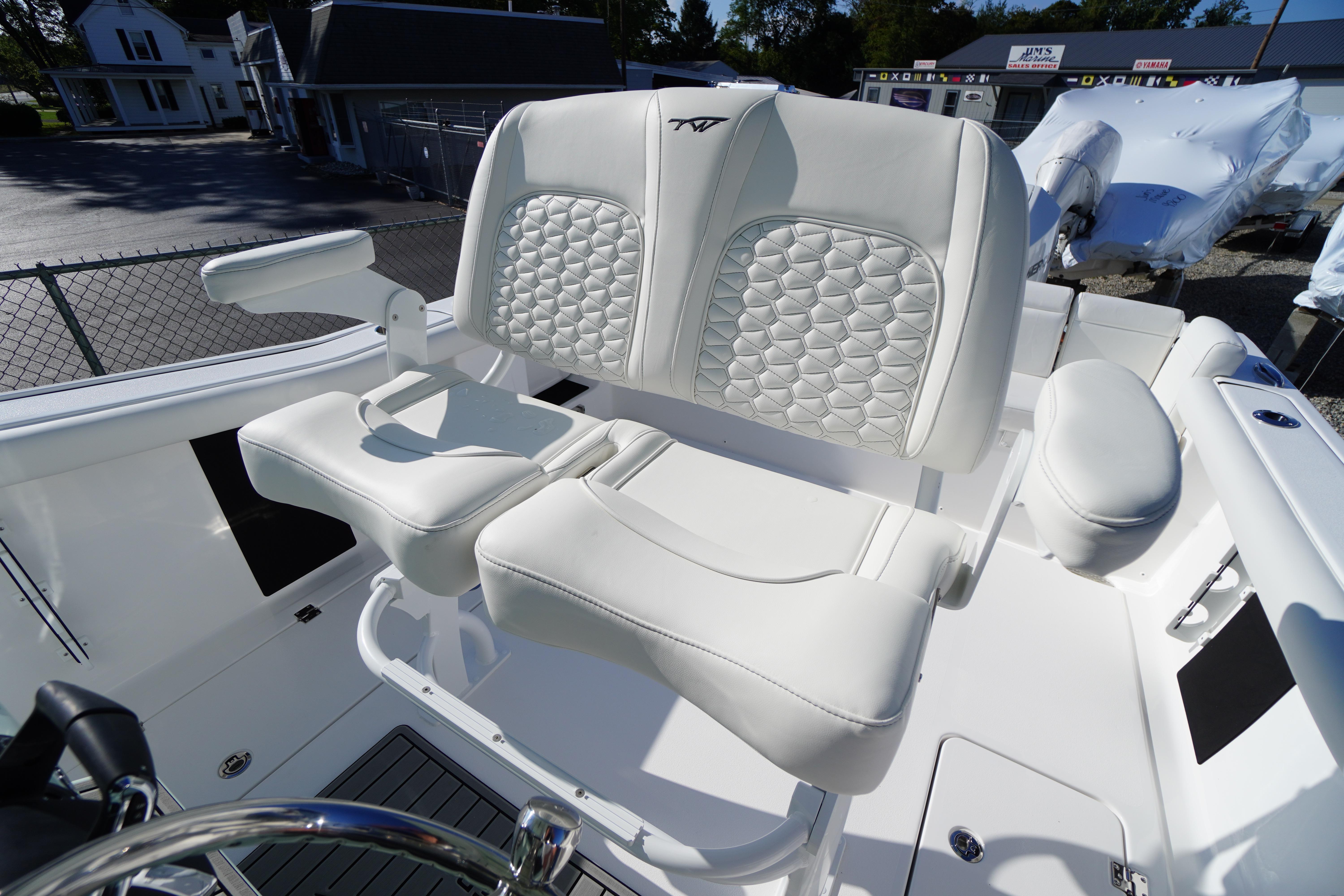 2026 Tidewater 272 LXF boat with luxurious white seating and modern design.