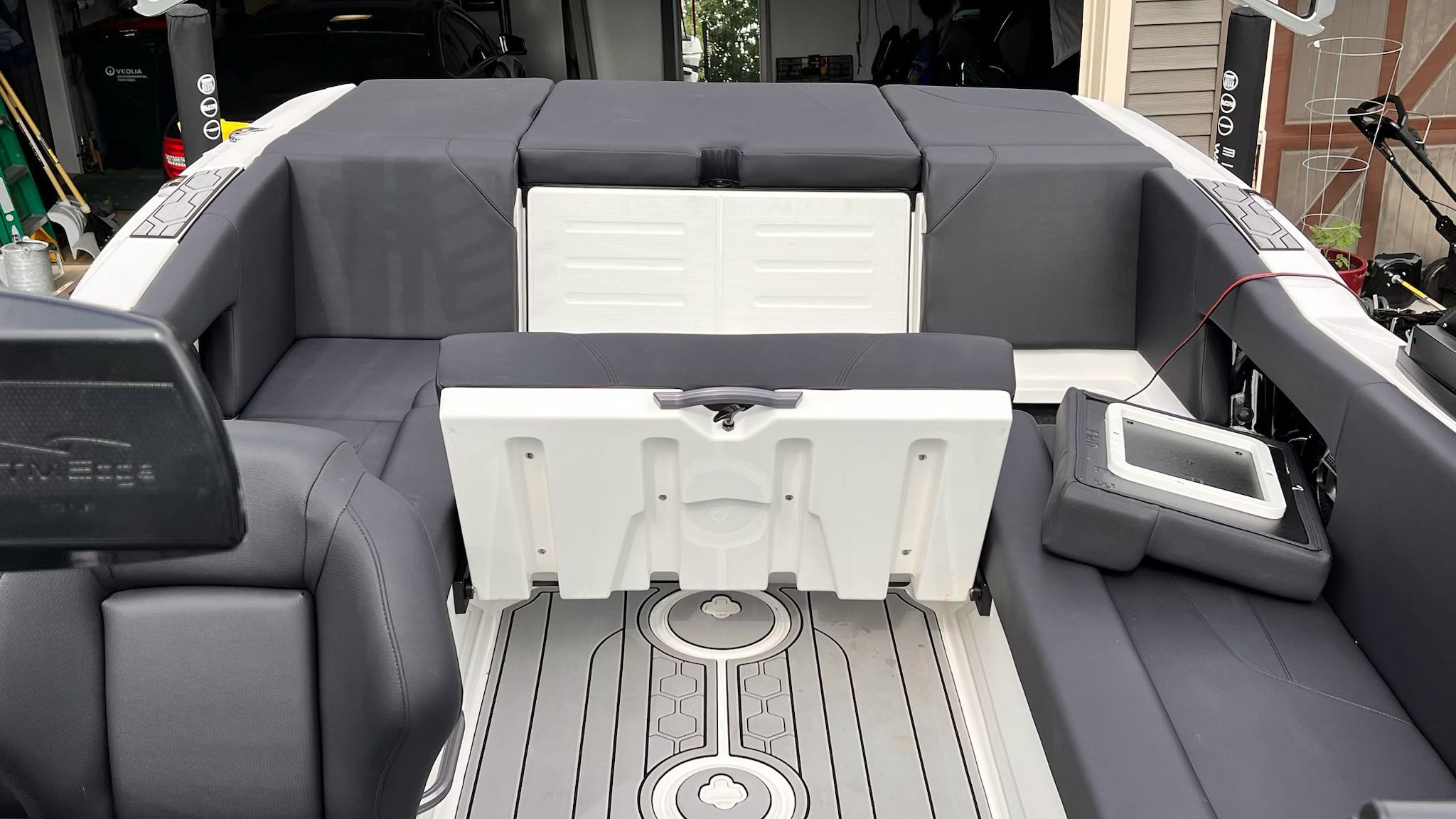The image shows the interior of a 2020 MasterCraft NXT22 boat with gray upholstery.