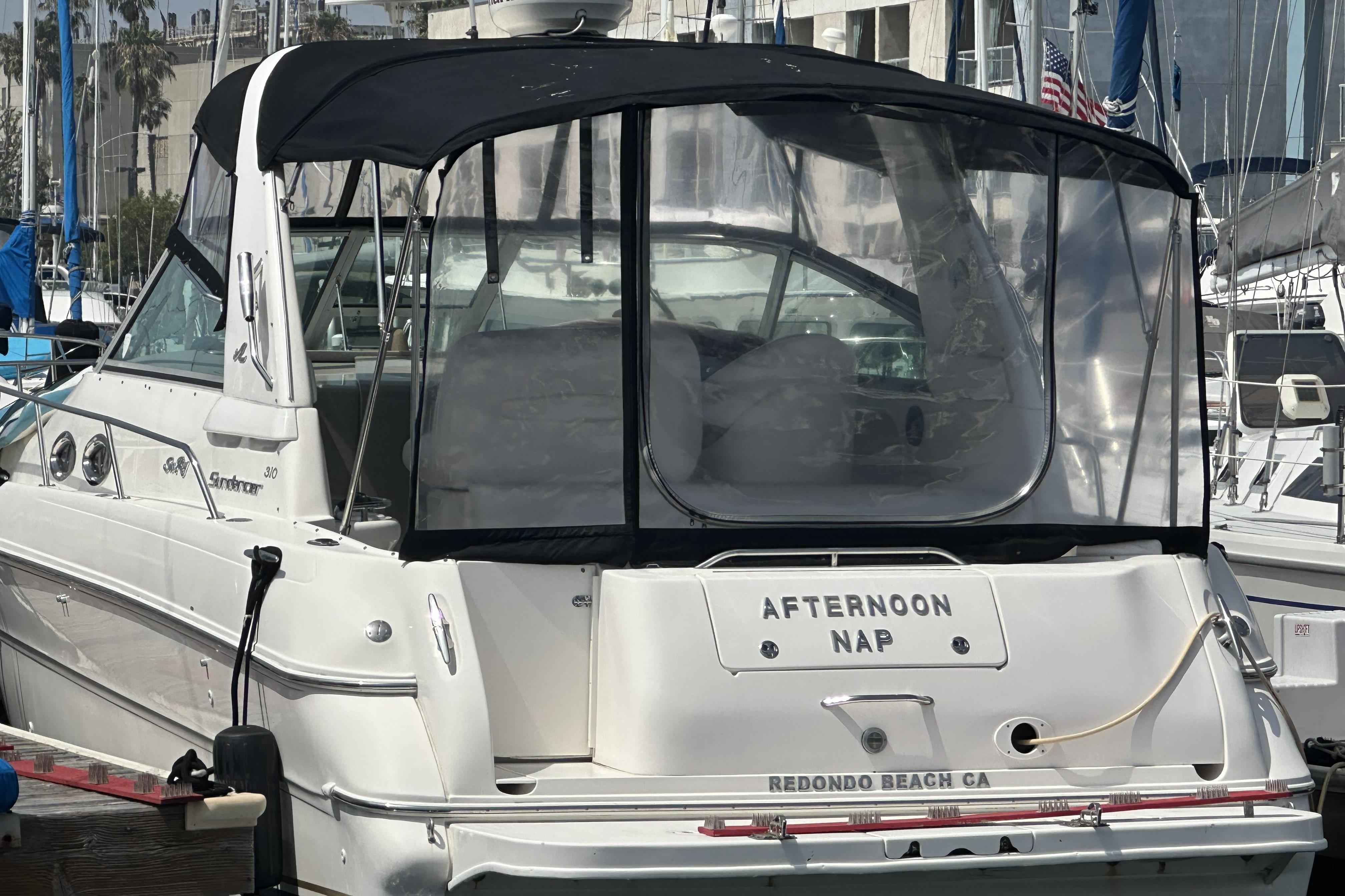 2001 Sea Ray Sundancer 310 boat docked at Redondo Beach, California.