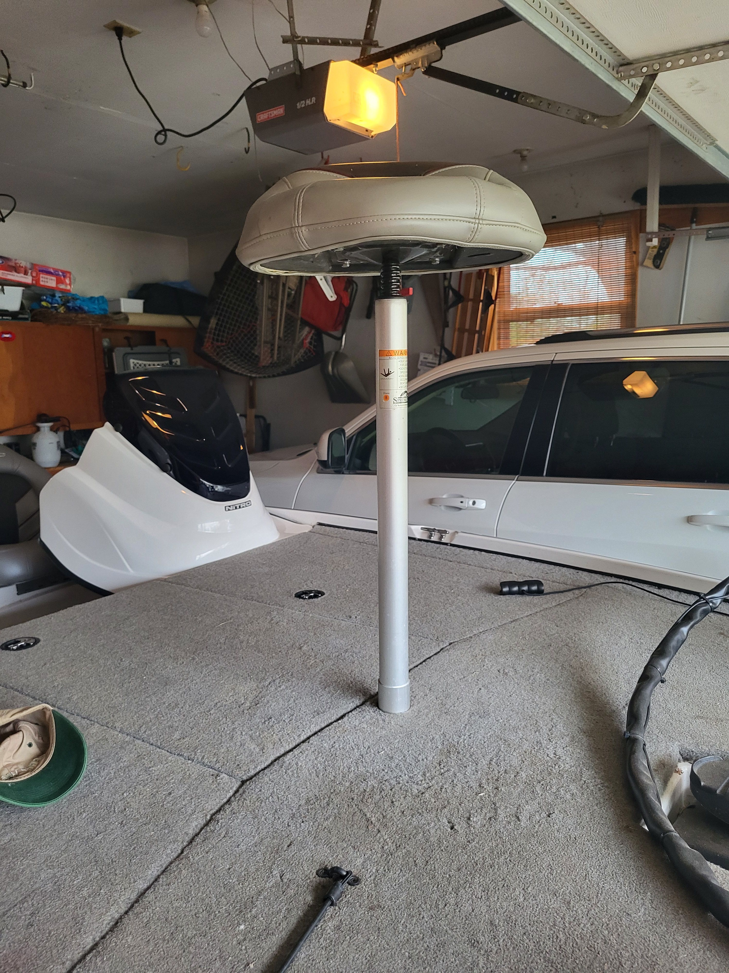 Interior view of a 2017 Nitro Z17 boat in a garage.