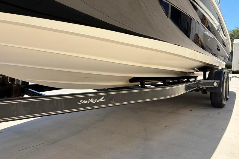 2007 Sea Ray 240 Sundeck boat on trailer, side view.