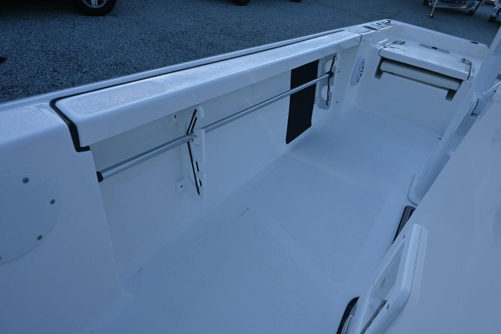2026 Tidewater 2110 Bay Max boat interior with sleek white design and storage features.