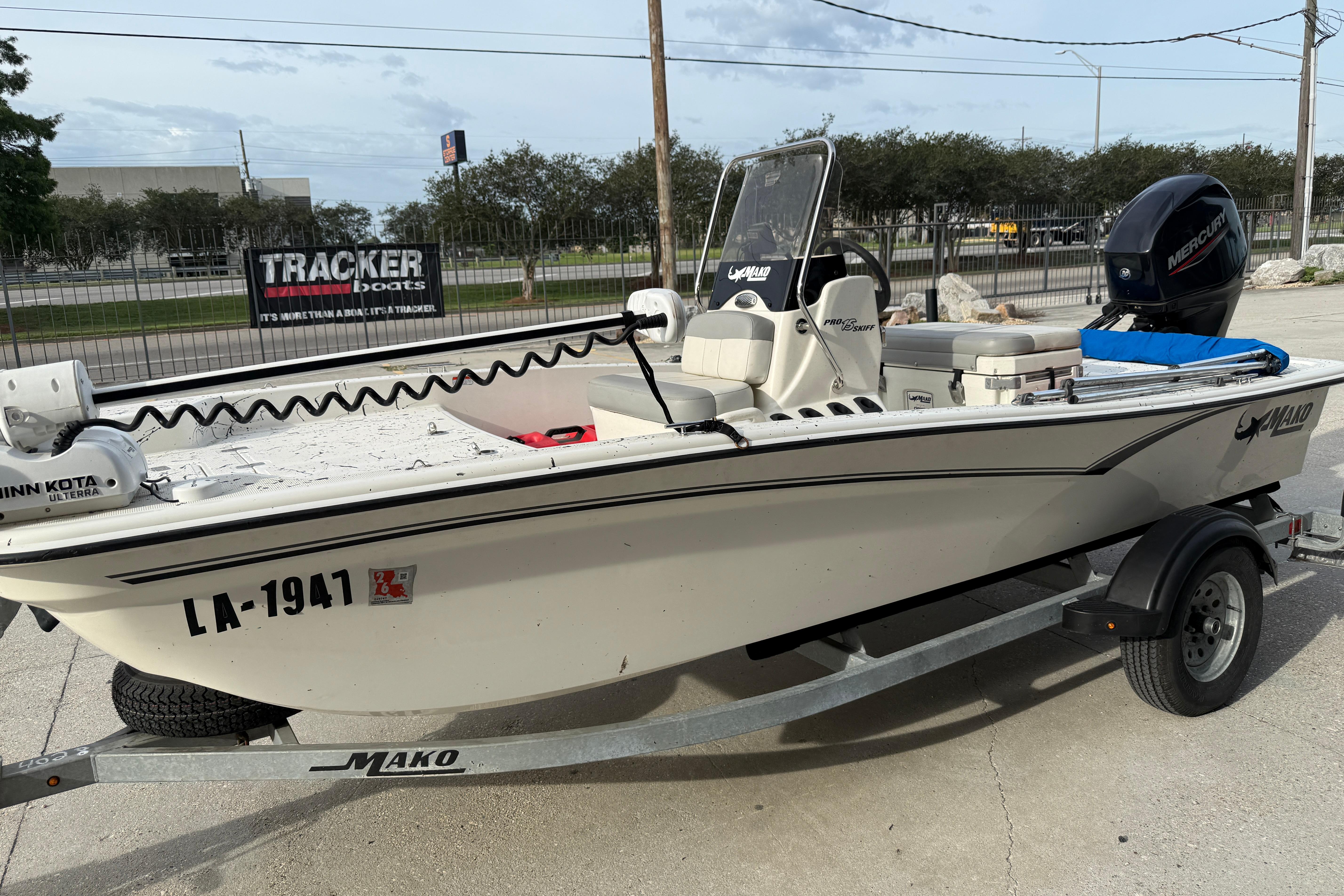 2020 Mako Pro Skiff 15 CC boat on trailer with Minn Kota motor and Mercury engine.