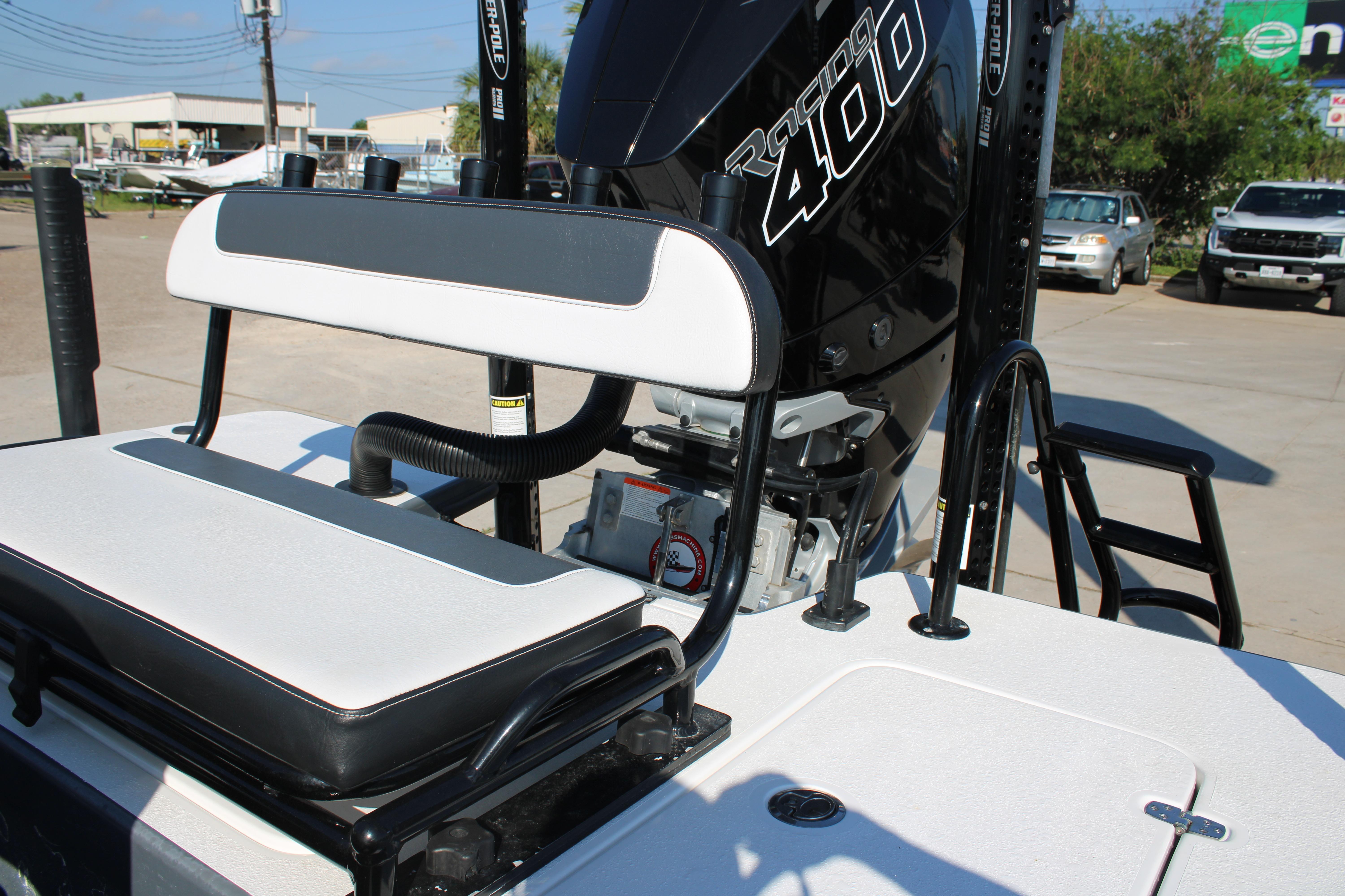 2023 Mamba 24VX boat with Racing 400 engine, featuring a sleek white and black seat design.