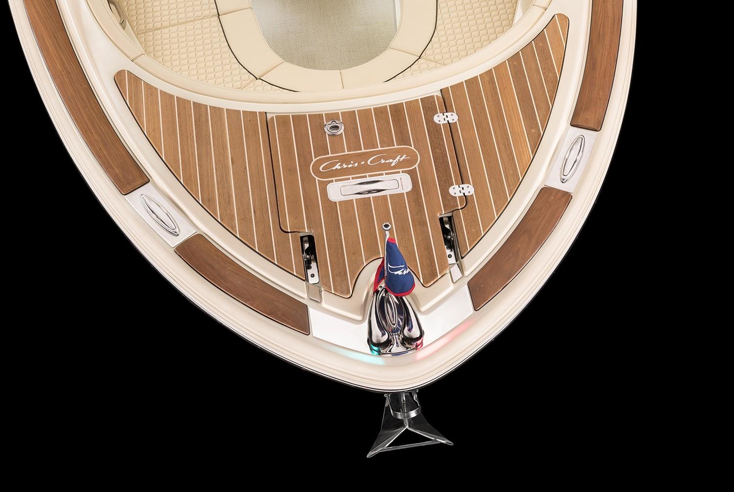 Manufacturer Provided Image: 2025 Chris-Craft Launch 28 GT boat deck with wood finish and flag detail.