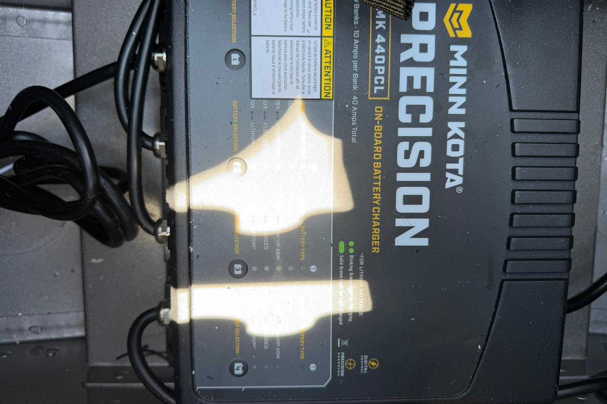 Minn Kota precision battery charger installed in the boat.