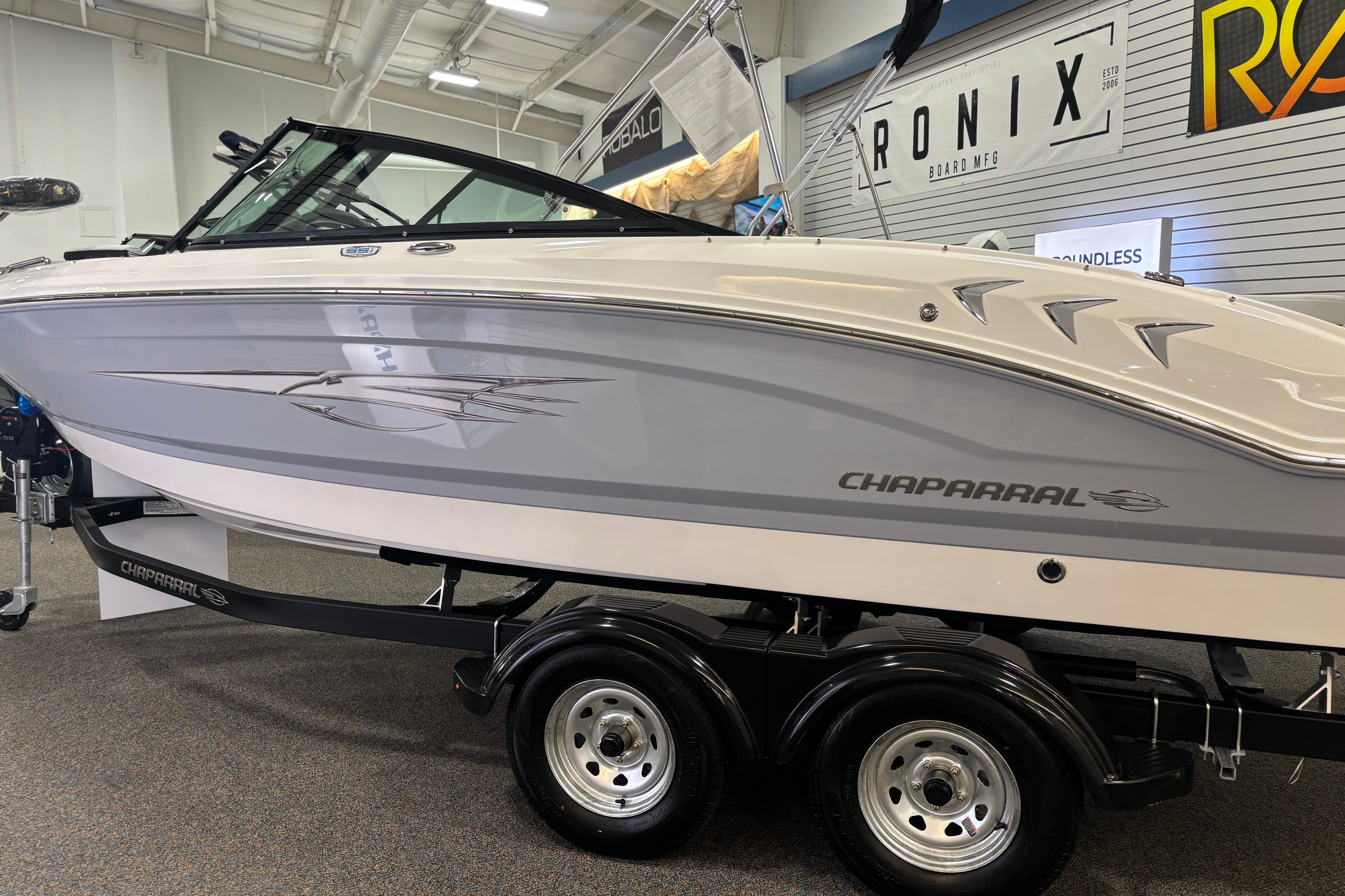2026 Chaparral 21 SSi Ski & Fish boat in showroom.