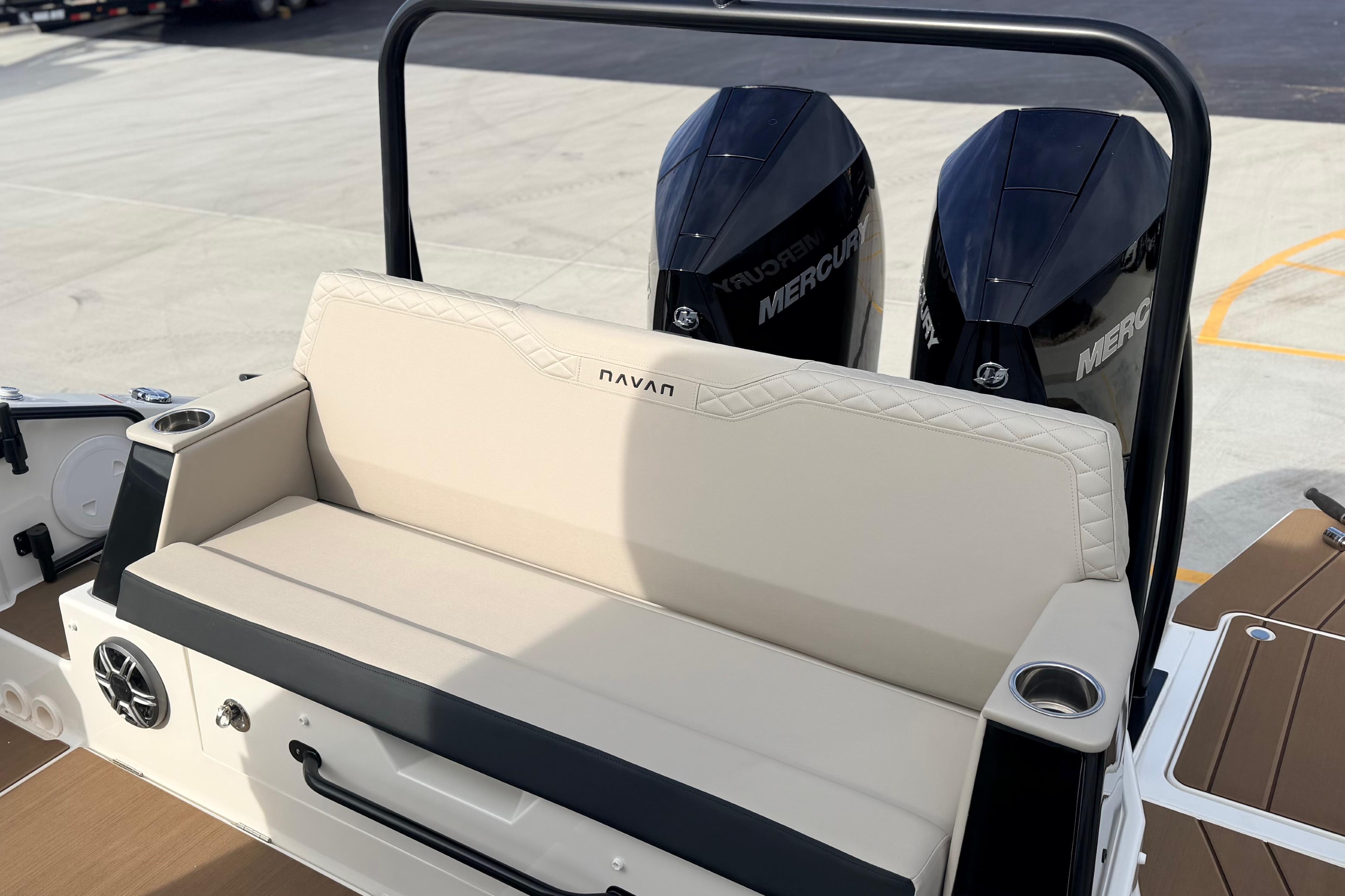 Navan S30 2026 boat with dual Mercury engines and beige seating on deck.