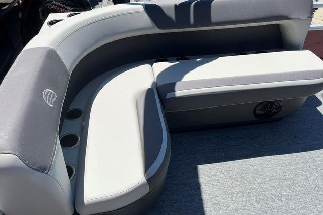 2026 Sun Tracker Bass Buggy 16 XL Select boat seating with cup holders.
