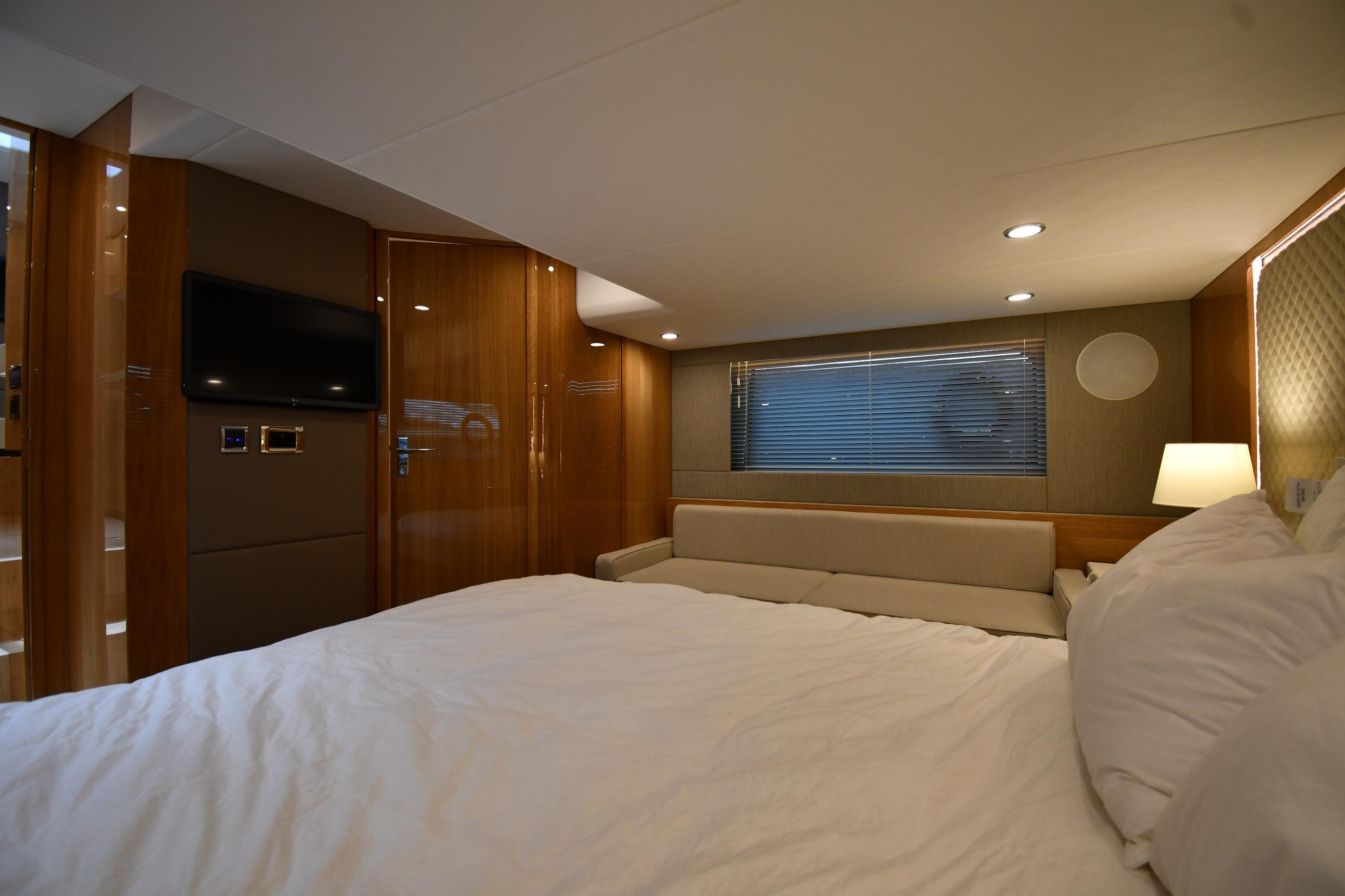 Luxurious interior of 2024 Fairline G50 Targa yacht with modern furnishings and ambient lighting.