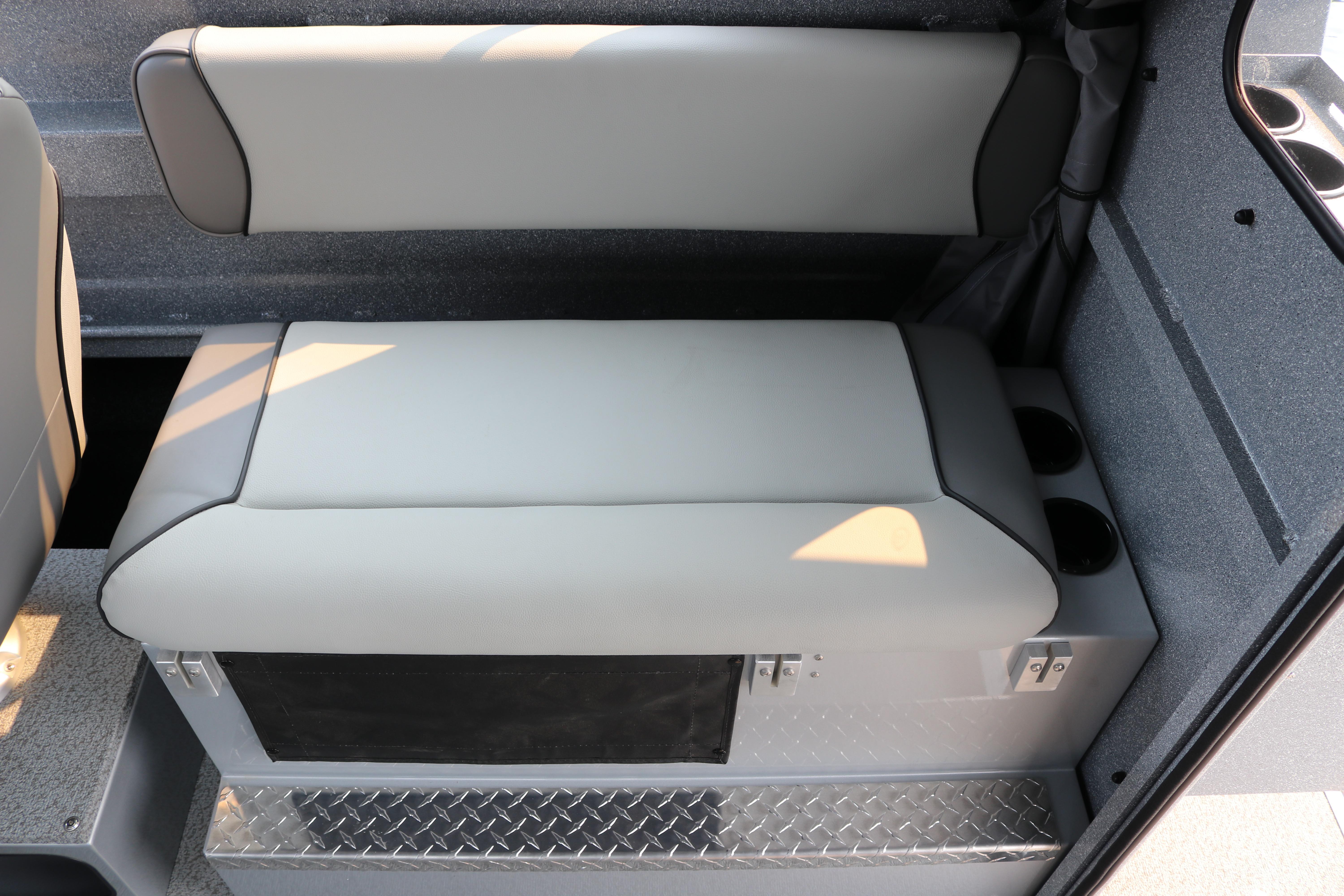 2026 KingFisher 2425 Escape HT interior seating with storage and cup holders.