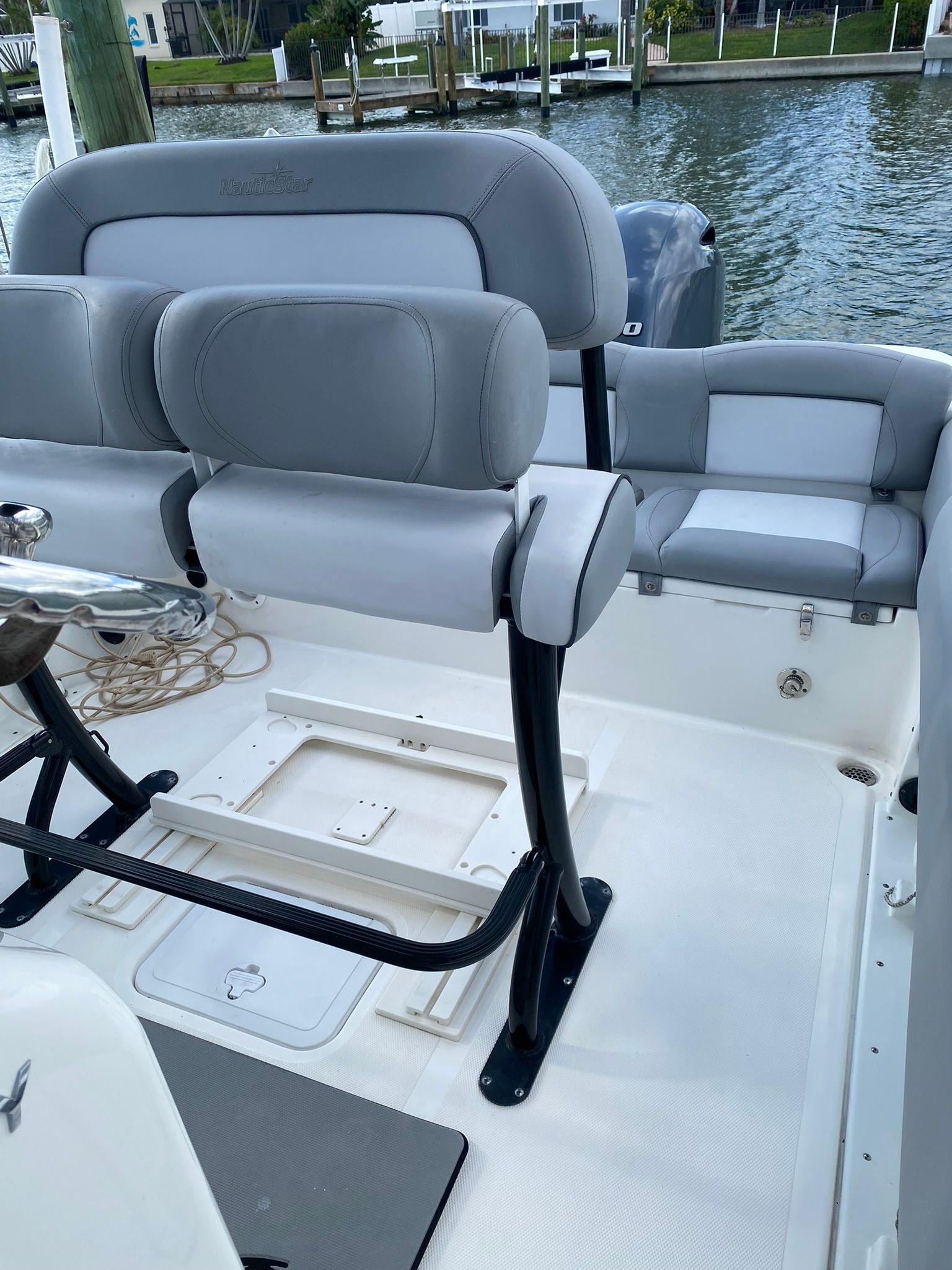 Interior of a 2021 NauticStar Legacy boat with gray seating.