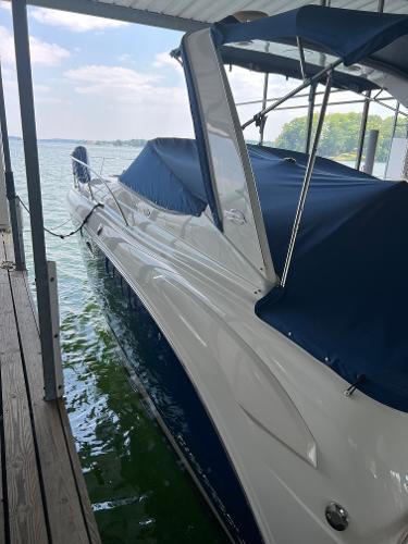 2008 Chaparral Signature 310 boat in water, side view.