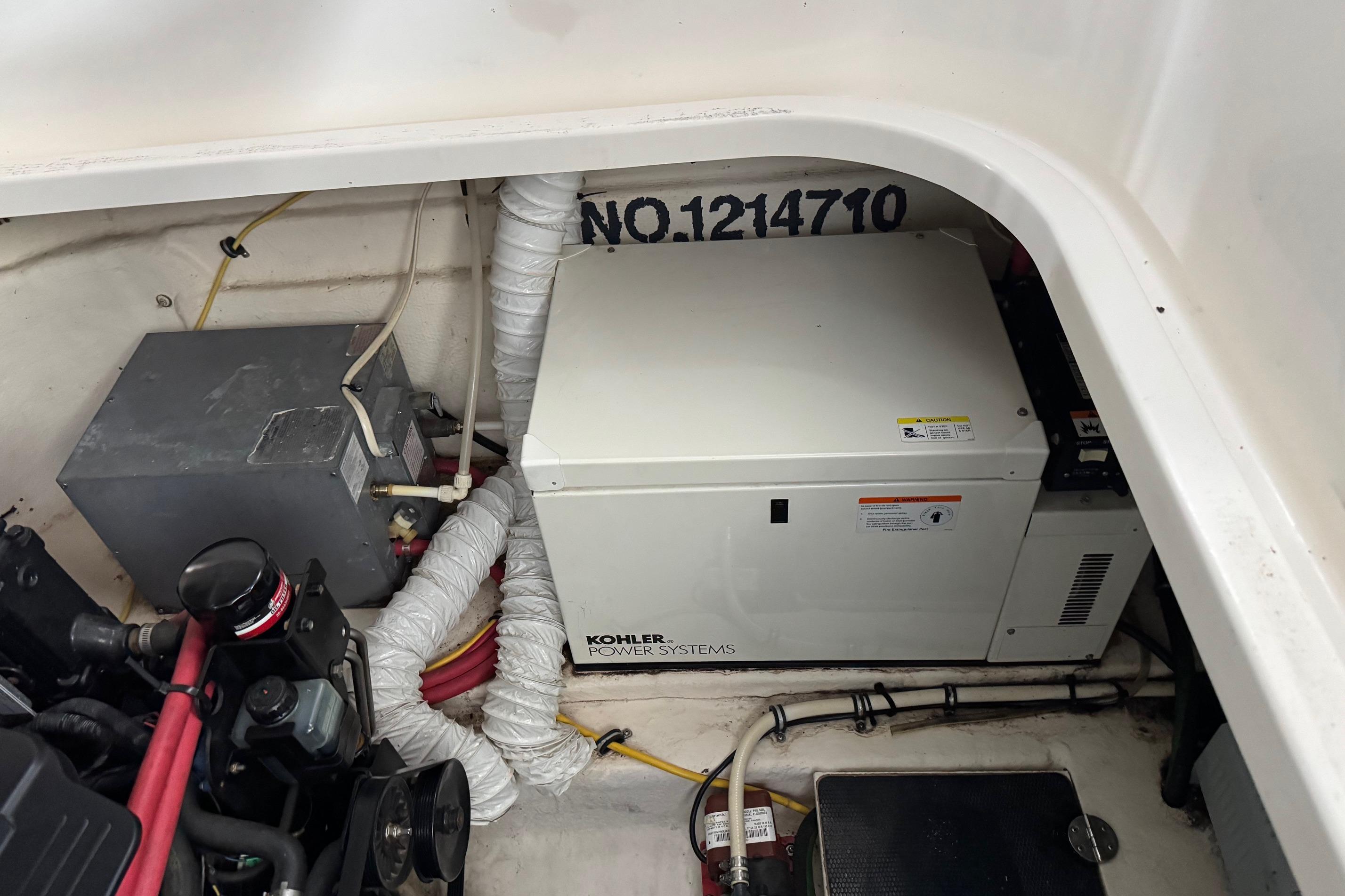 Engine compartment of 2006 Chaparral 330 Signature with Kohler power system.