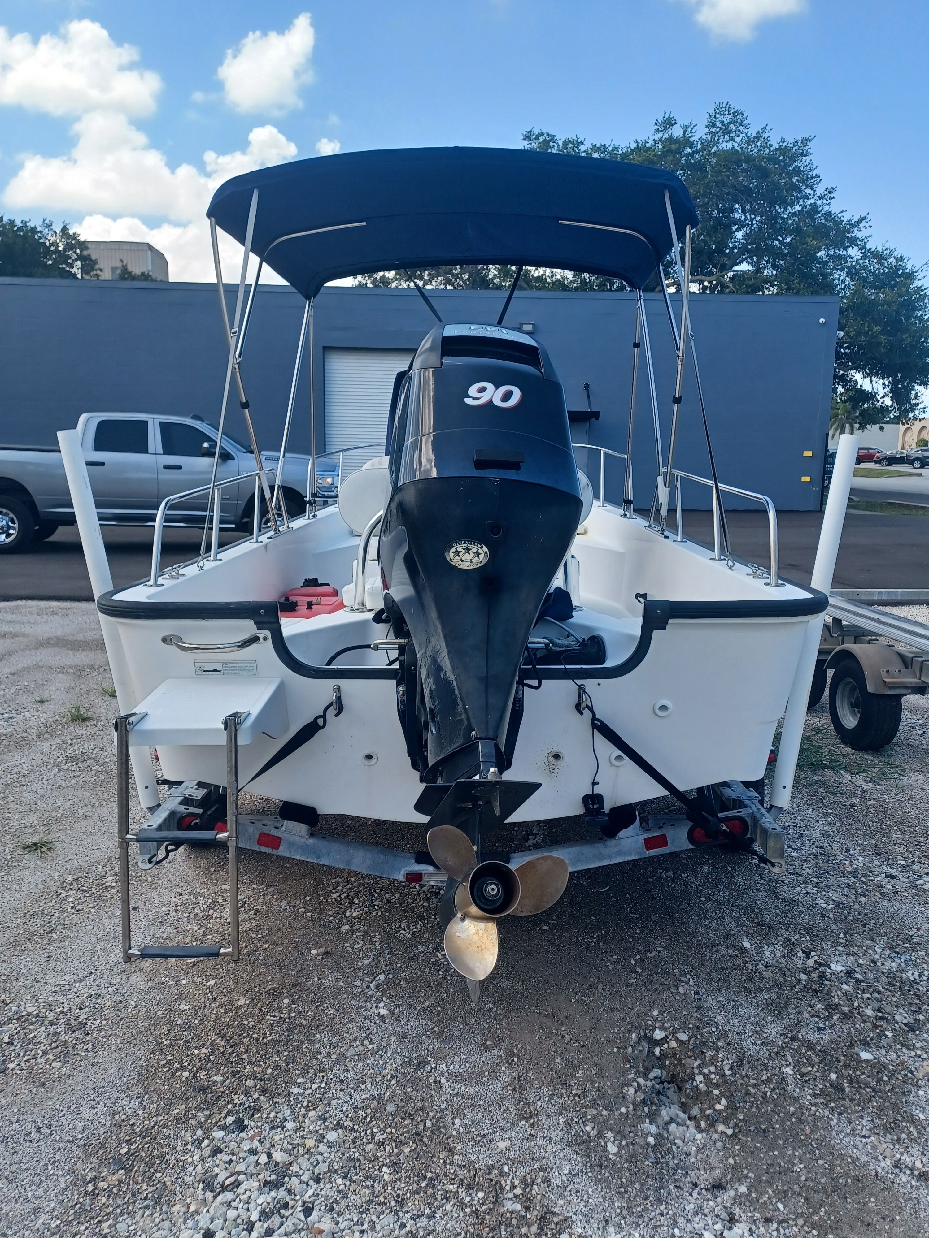 The image shows a 2008 Boston Whaler 170 Montauk boat with a 90 HP engine.