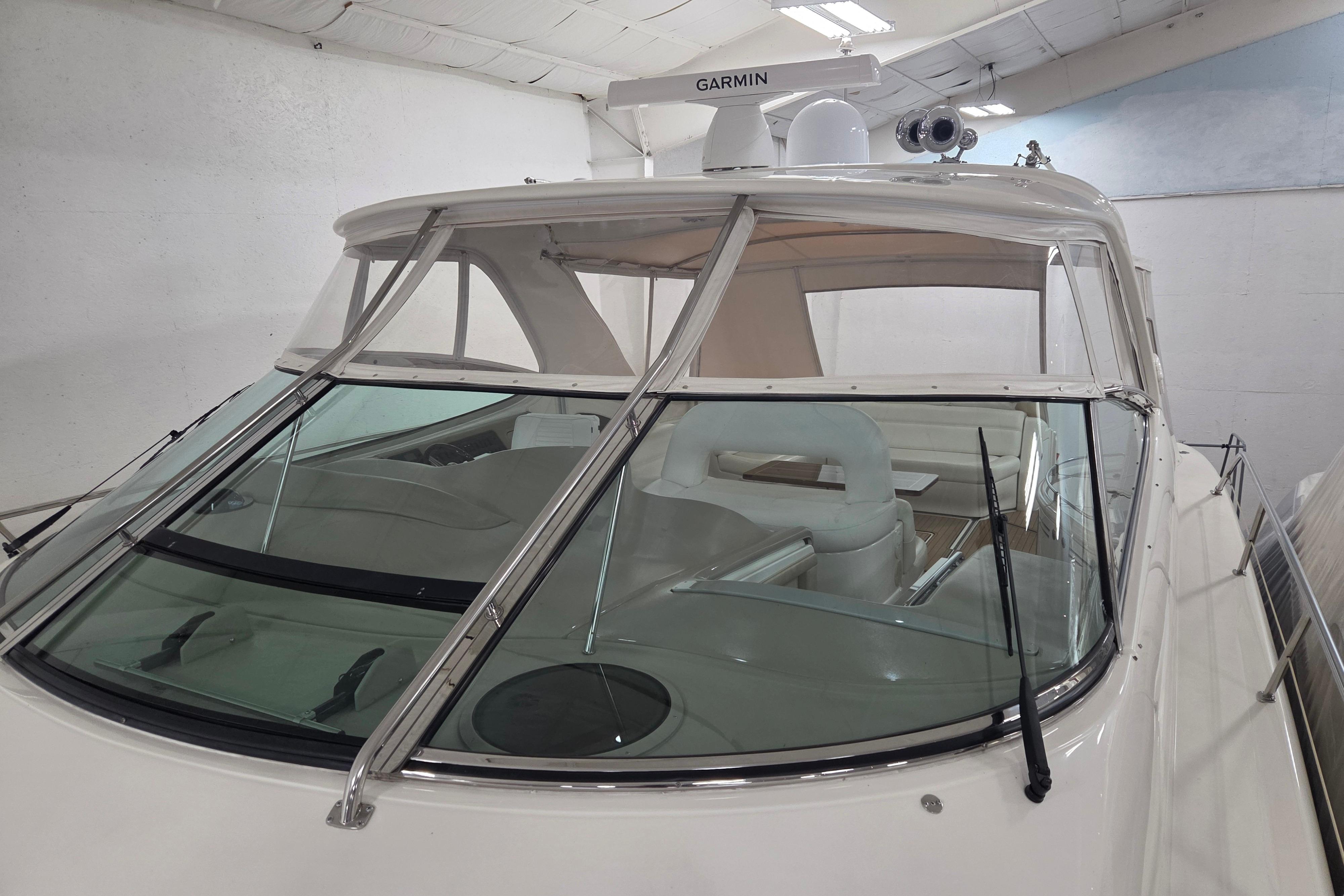 2000 Sea Ray Sundancer 540 yacht with Garmin equipment, showcased indoors.