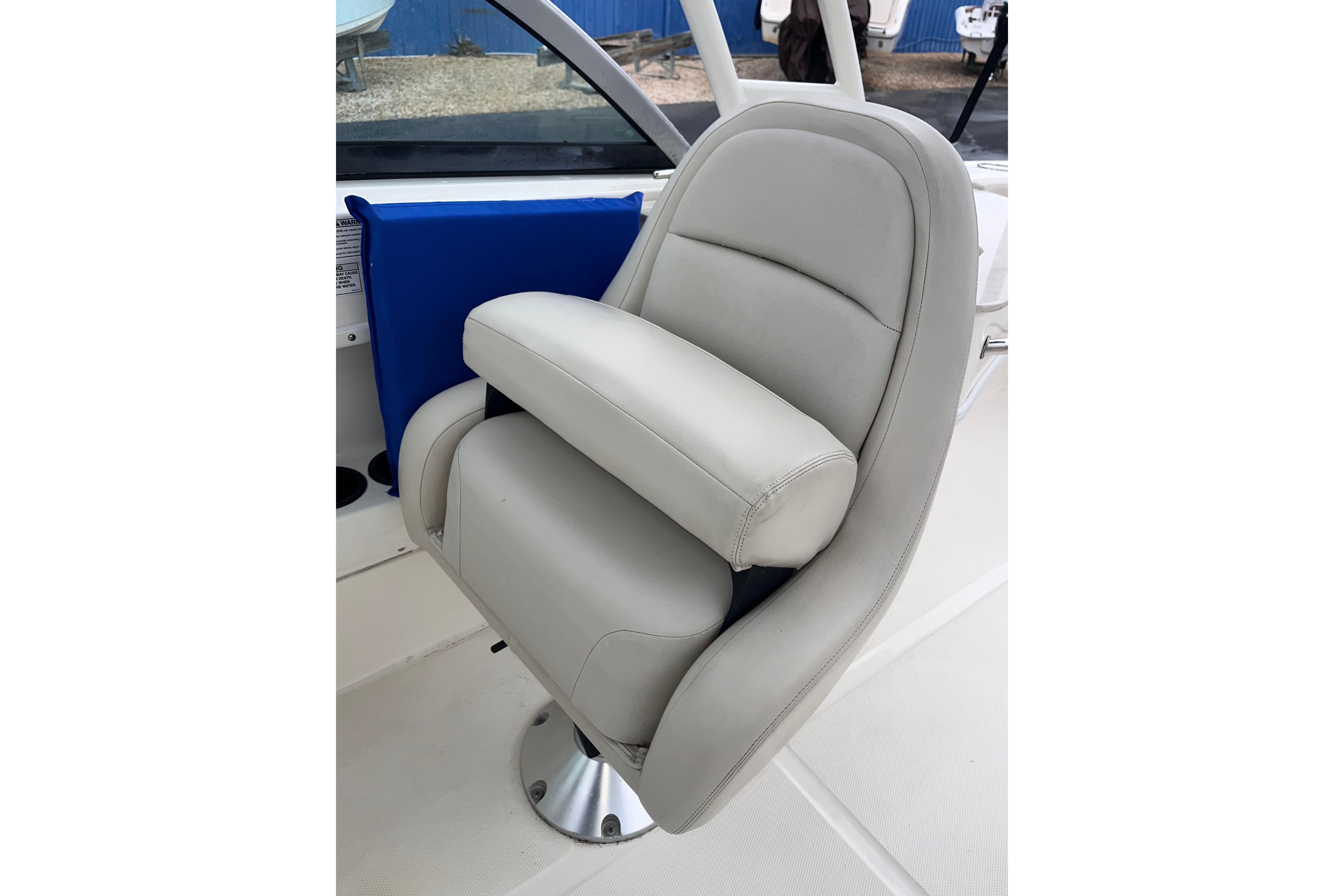 2015 Boston Whaler 230 Vantage boat seat, gray upholstery, modern design.