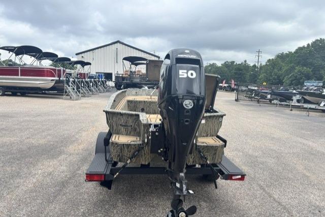 2026 Tracker Grizzly 1650 T Prairie Wings Edition boat with Mercury 50 engine in a dealership lot.