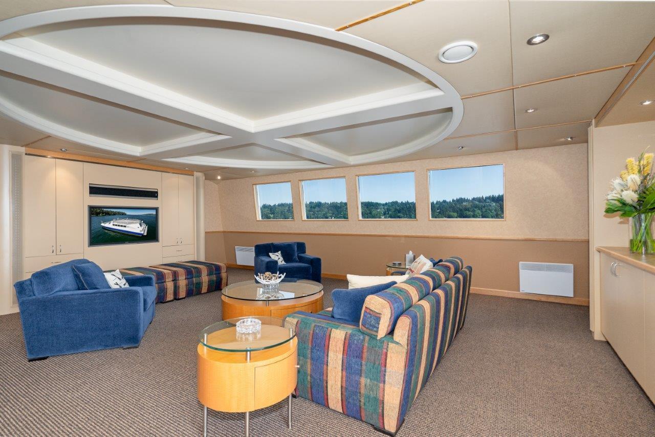 Luxurious interior of 1999 Dakota Creek Catamaran, featuring elegant seating and panoramic windows.