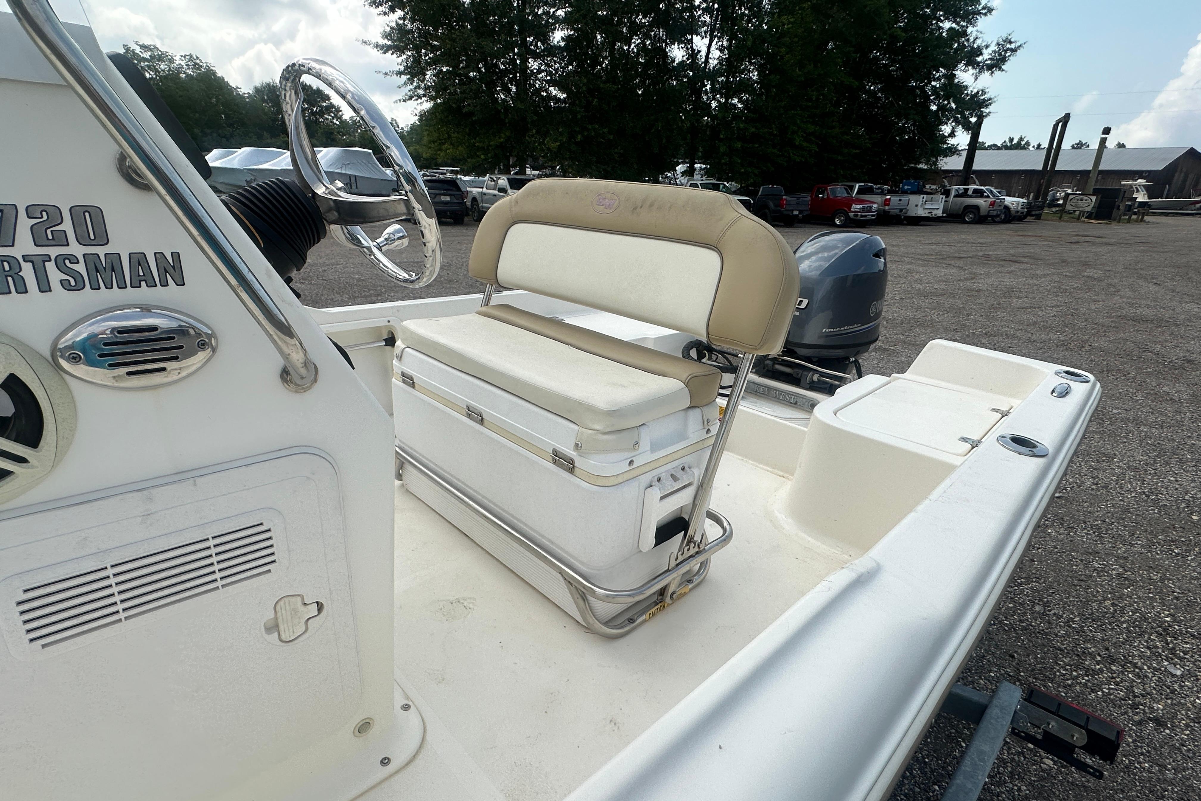 2018 Key West 1720 Center Console boat interior with seating and steering wheel.