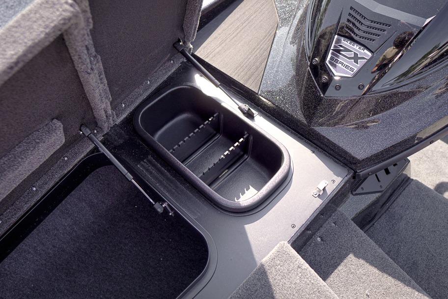 2026 Skeeter ZX200 boat storage compartment with open lid, showcasing interior design.