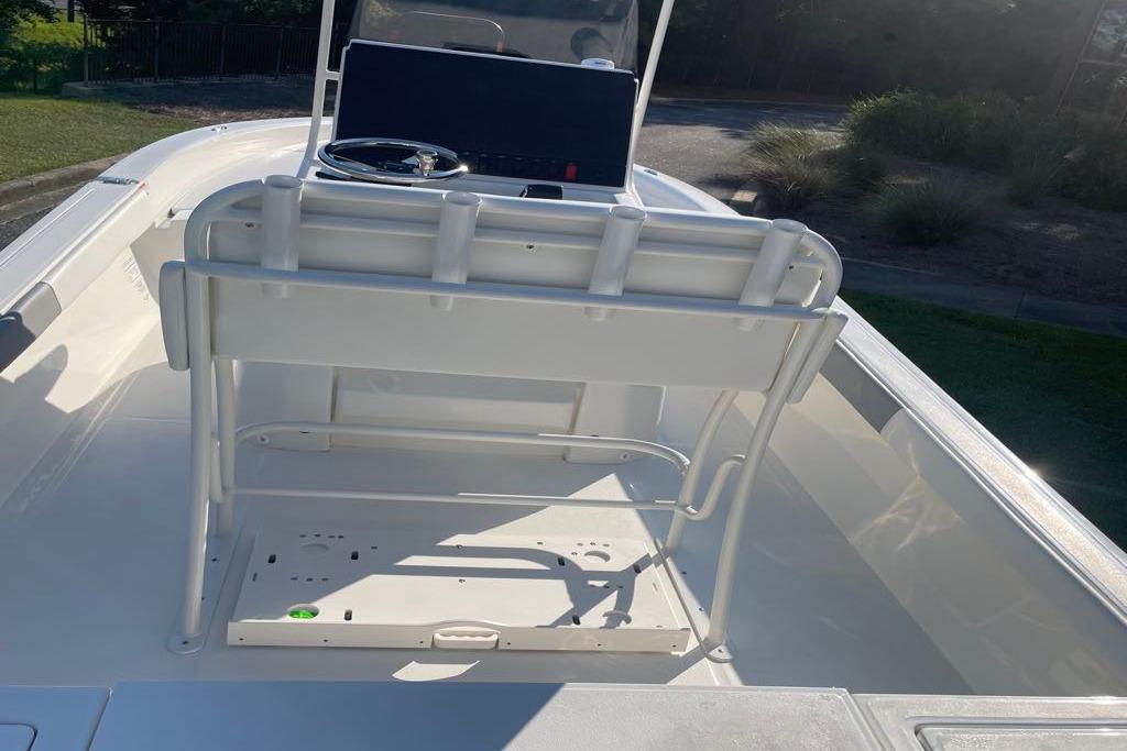 2026 Mako 24 APEX boat interior with steering console and seating.