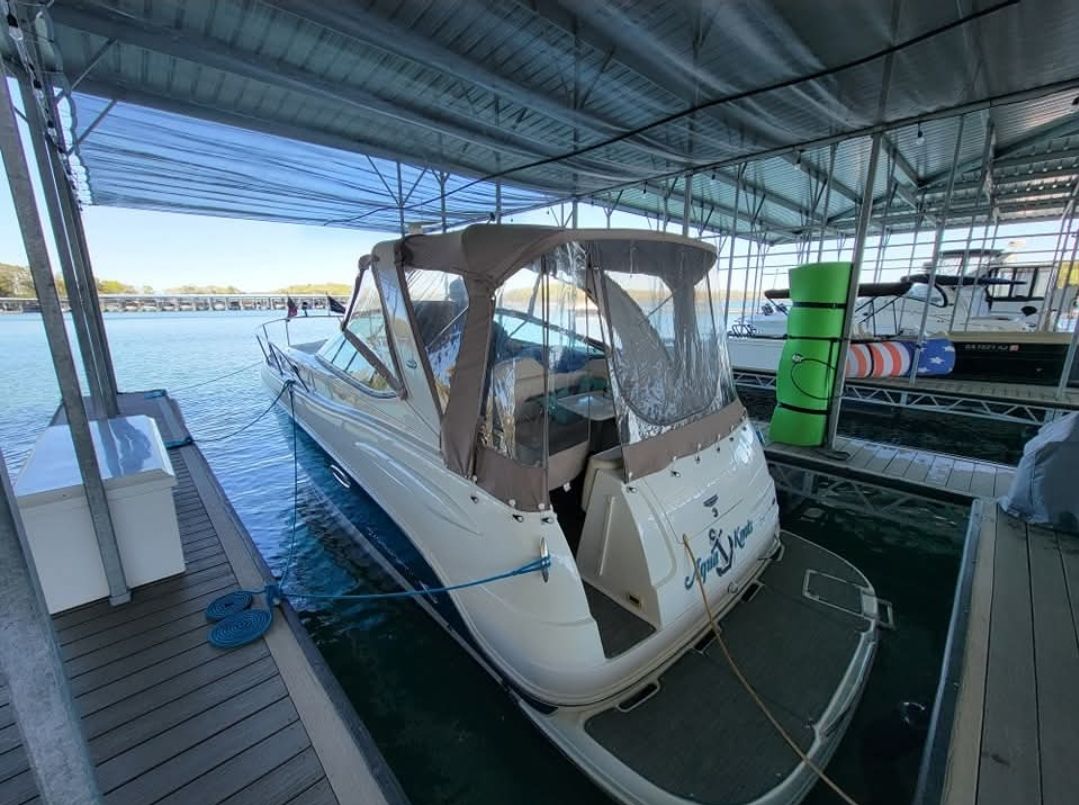 2006 Chaparral Signature 280 boat docked in marina.