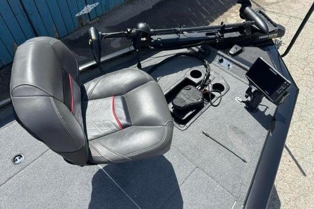 2023 Tracker Pro Team 190 TX Tournament Edition boat interior with seat and fishing equipment.