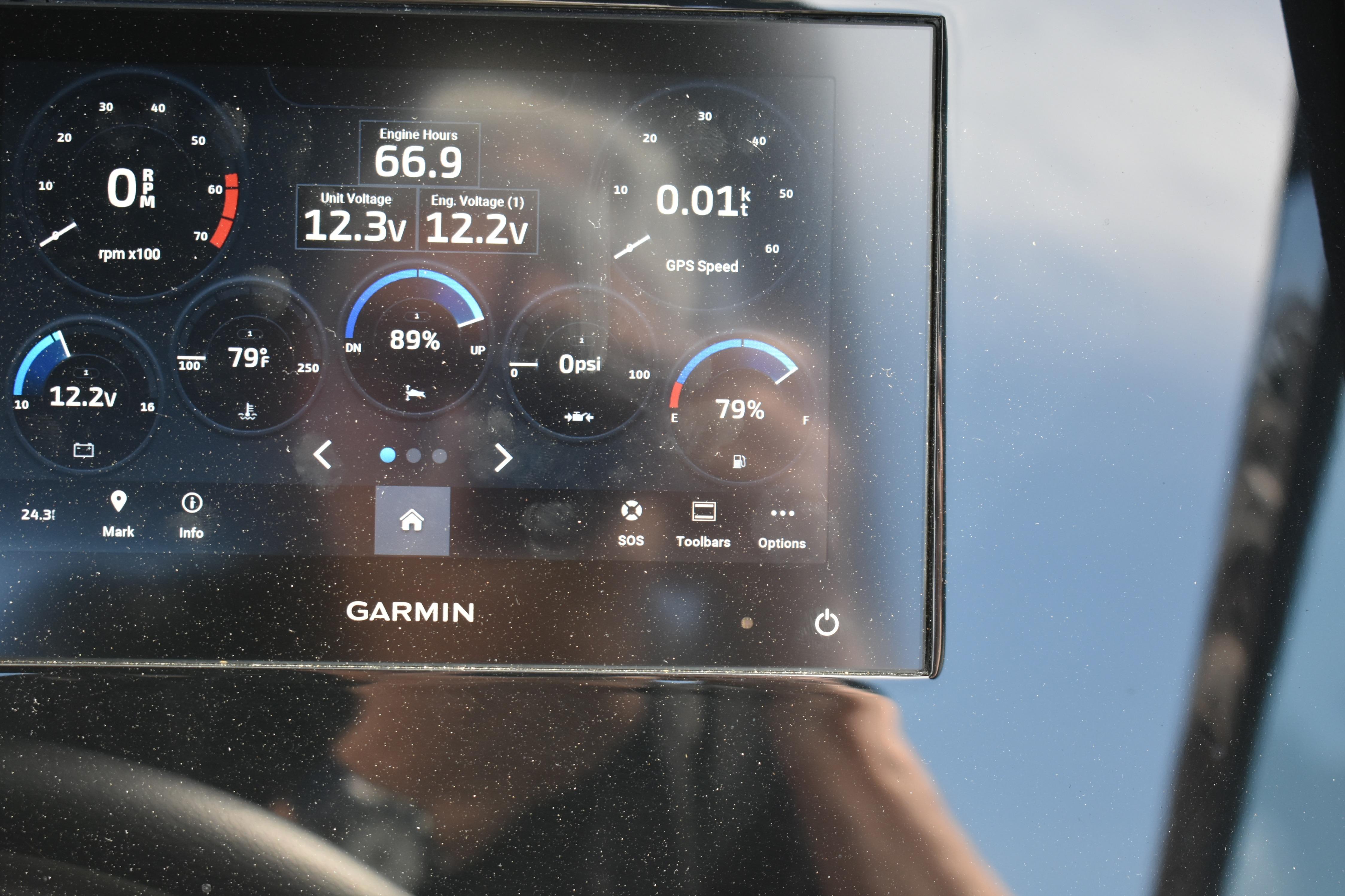 Garmin display showing Cobalt R8 2023 engine metrics, including RPM, voltage, and fuel levels.