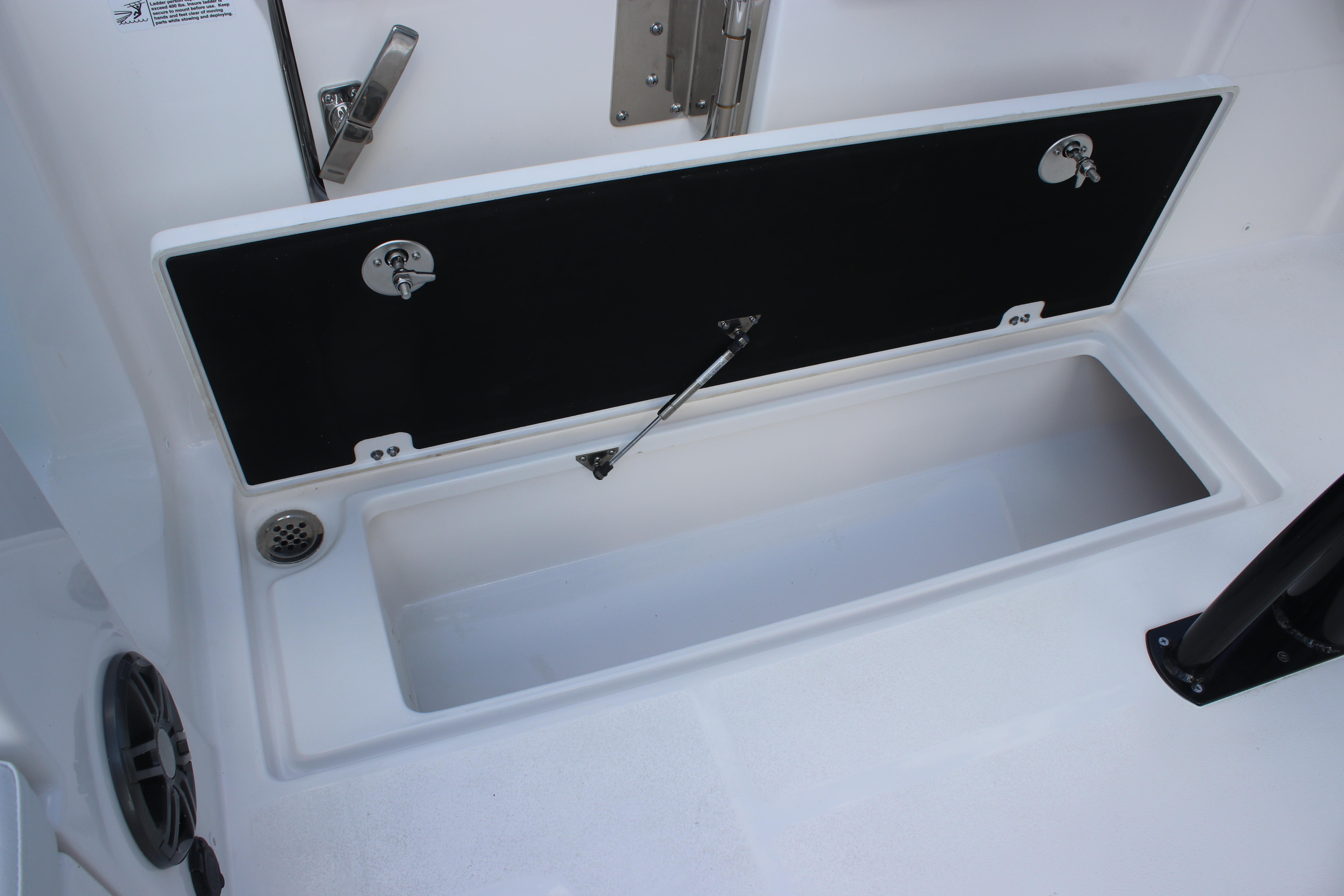 Open storage compartment on 2026 Sea Fox 268 Commander boat.