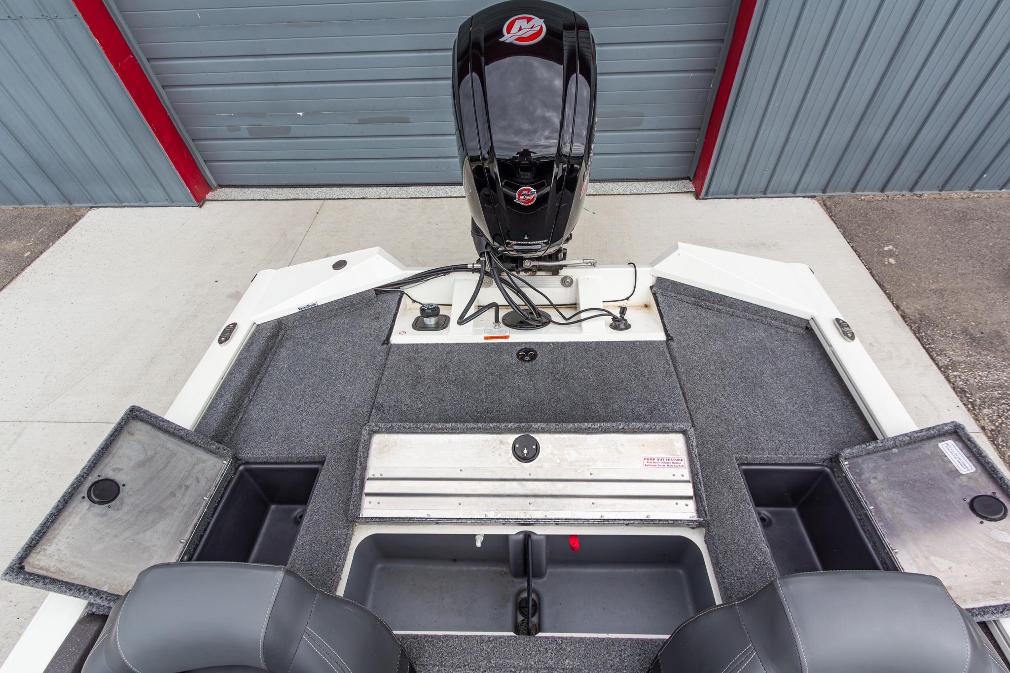 2023 Tracker Pro Team 190 TX boat interior with motor and storage compartments.