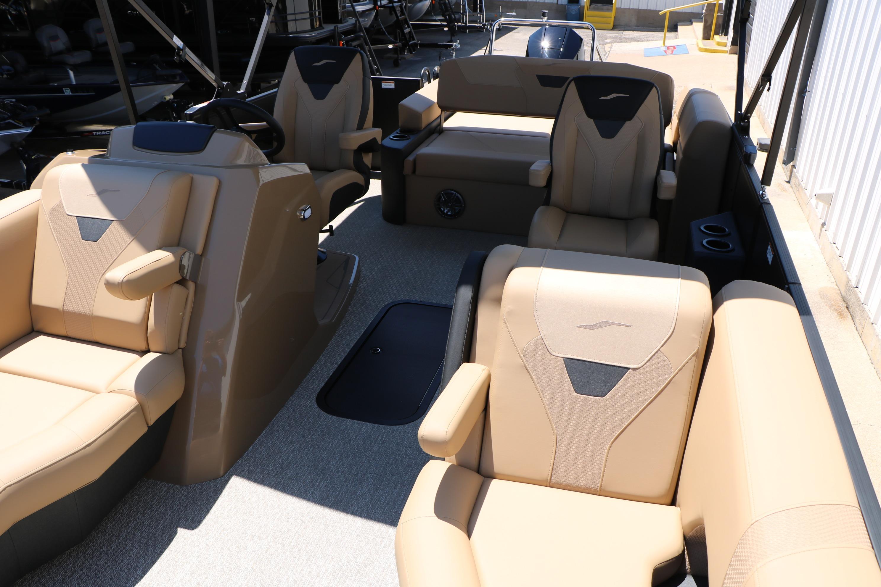 Luxurious interior of 2026 Evotti 521CS boat with beige seating and modern design.