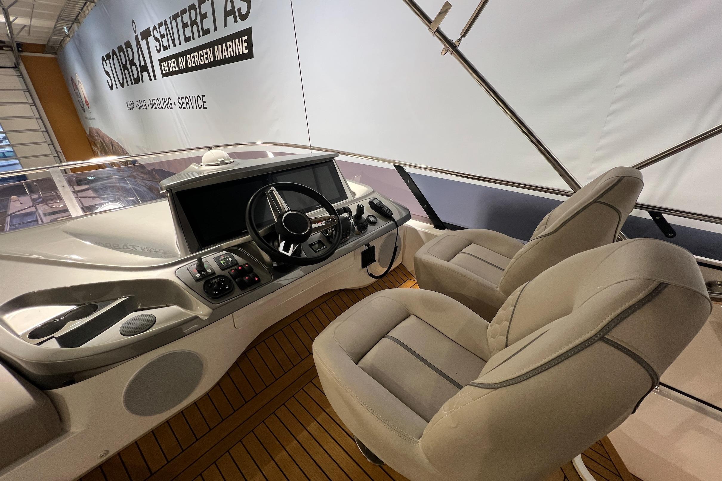 Helm of 2019 Princess F45 yacht with dual seats and modern controls.