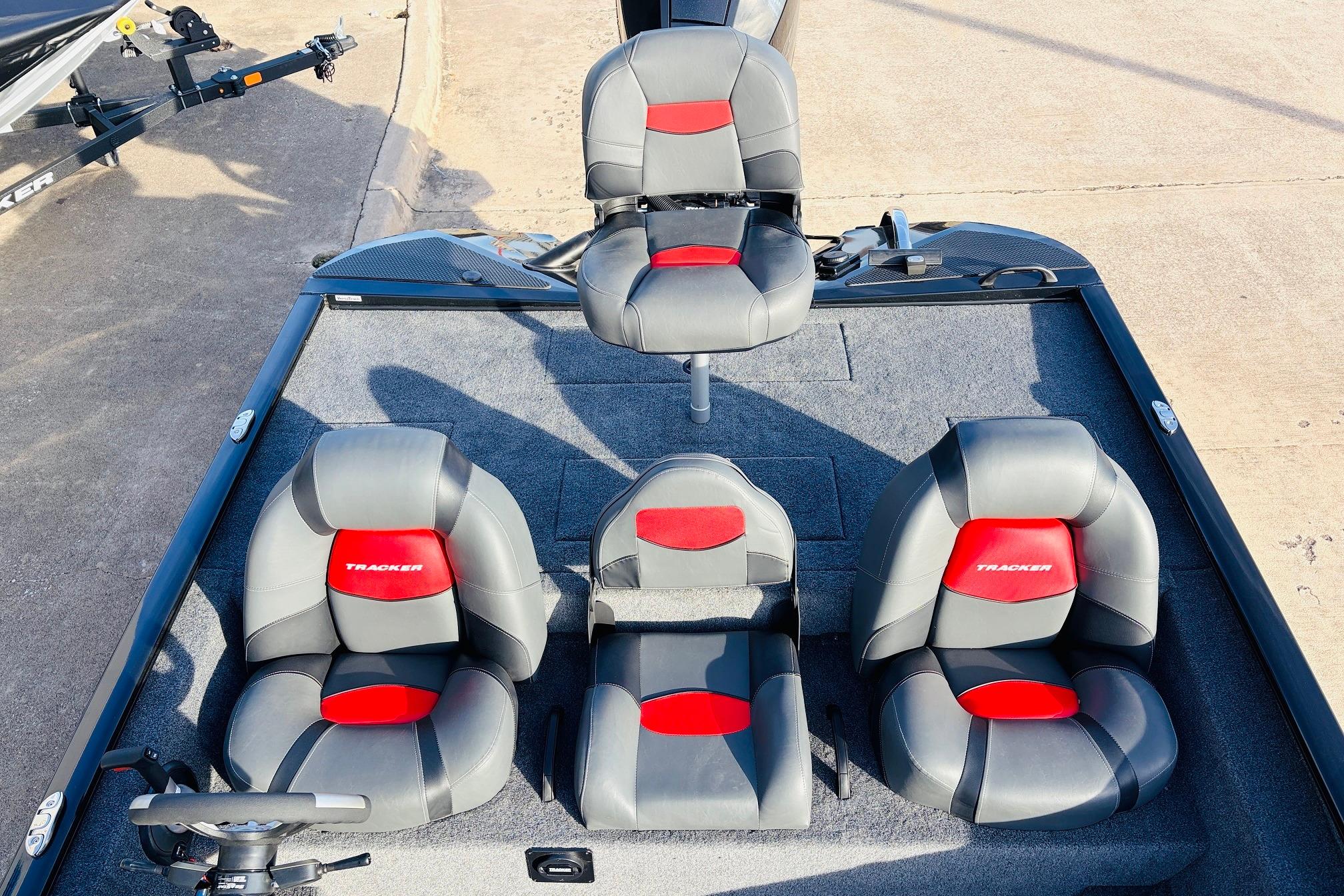 2025 Tracker Savage 215 boat interior with four gray and red seats.