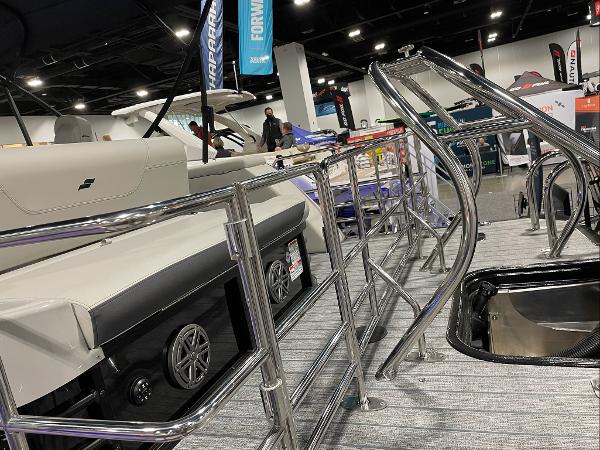 2022 Starcraft SLS-3Q DH pontoon boat on display at a boat show.