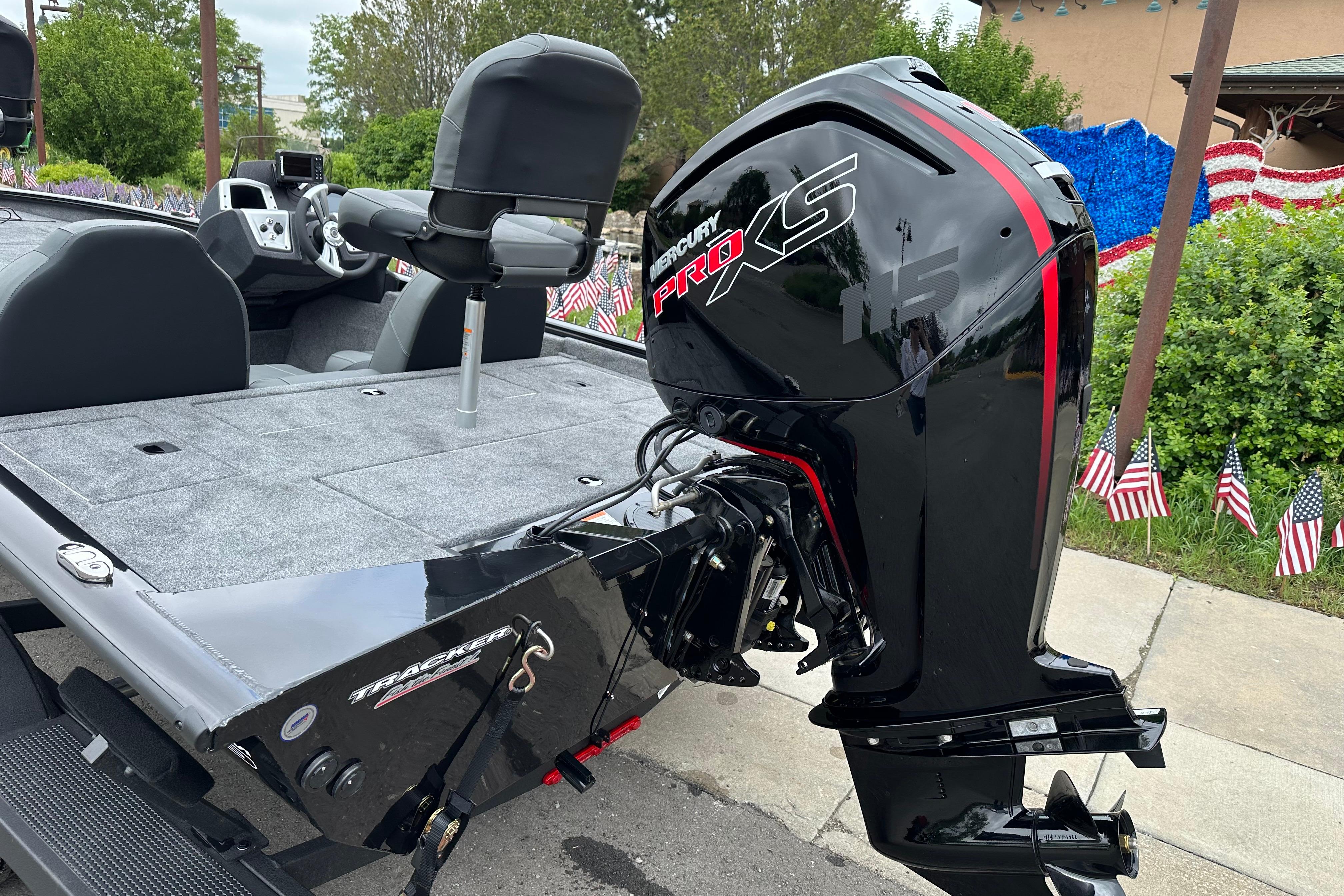 2026 Tracker Pro Team 190 boat with Mercury Pro XS engine, parked outdoors.