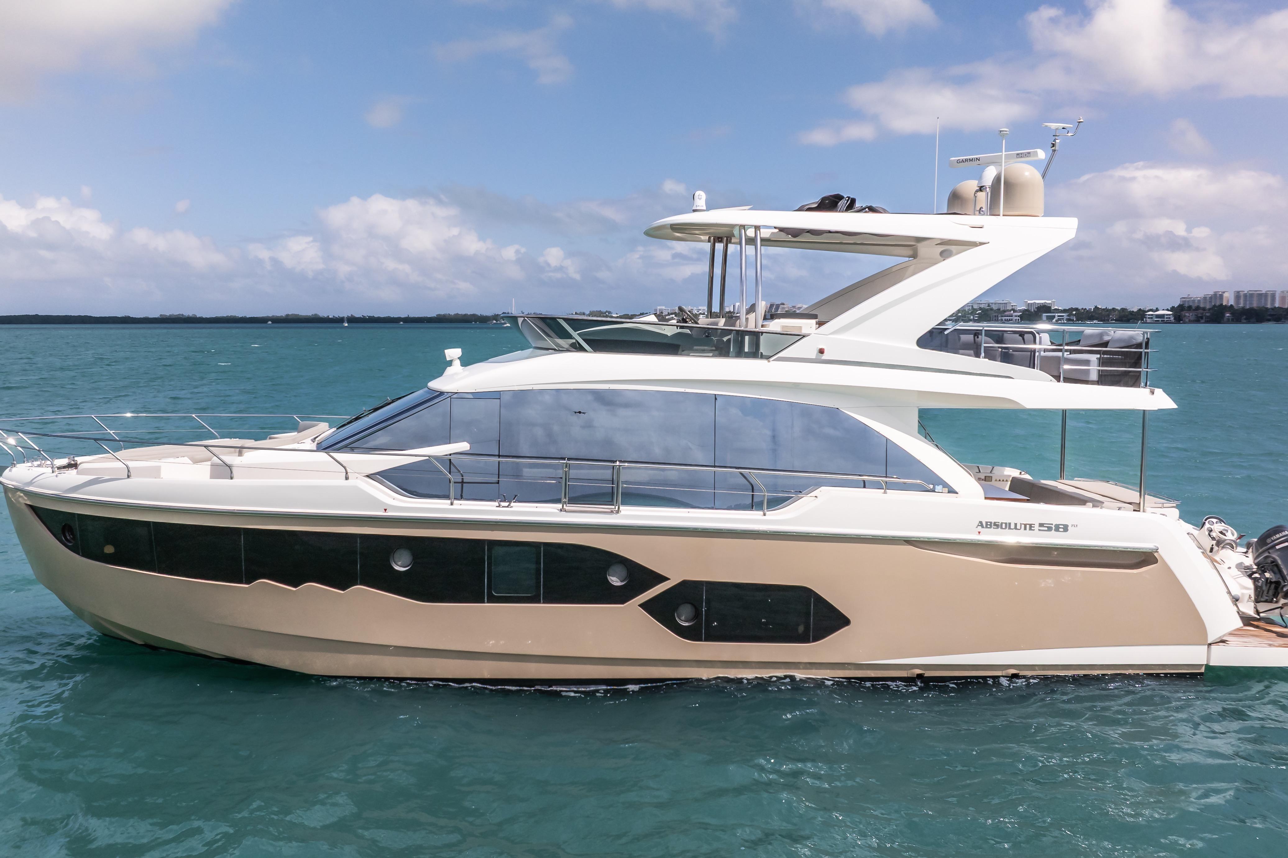 Luxury 2019 Absolute 58 FLY yacht cruising on clear blue waters.
