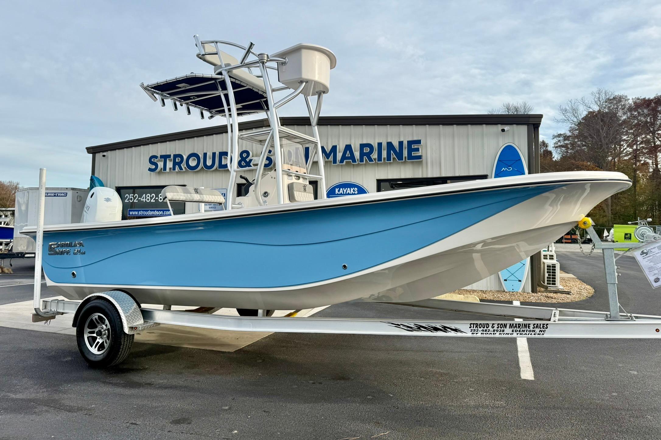 2025 Carolina Skiff 21 LS boat in blue on trailer at Stroud & Son Marine.