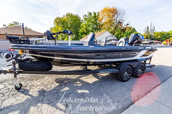 2024 Recon 985 SC fishing boat on trailer at Lakeside Marina.