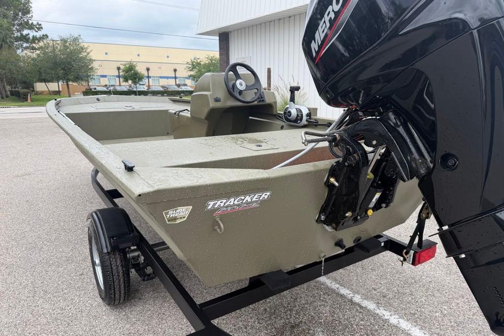 2026 Tracker Grizzly 1648 SC boat with Mercury outboard motor on trailer.