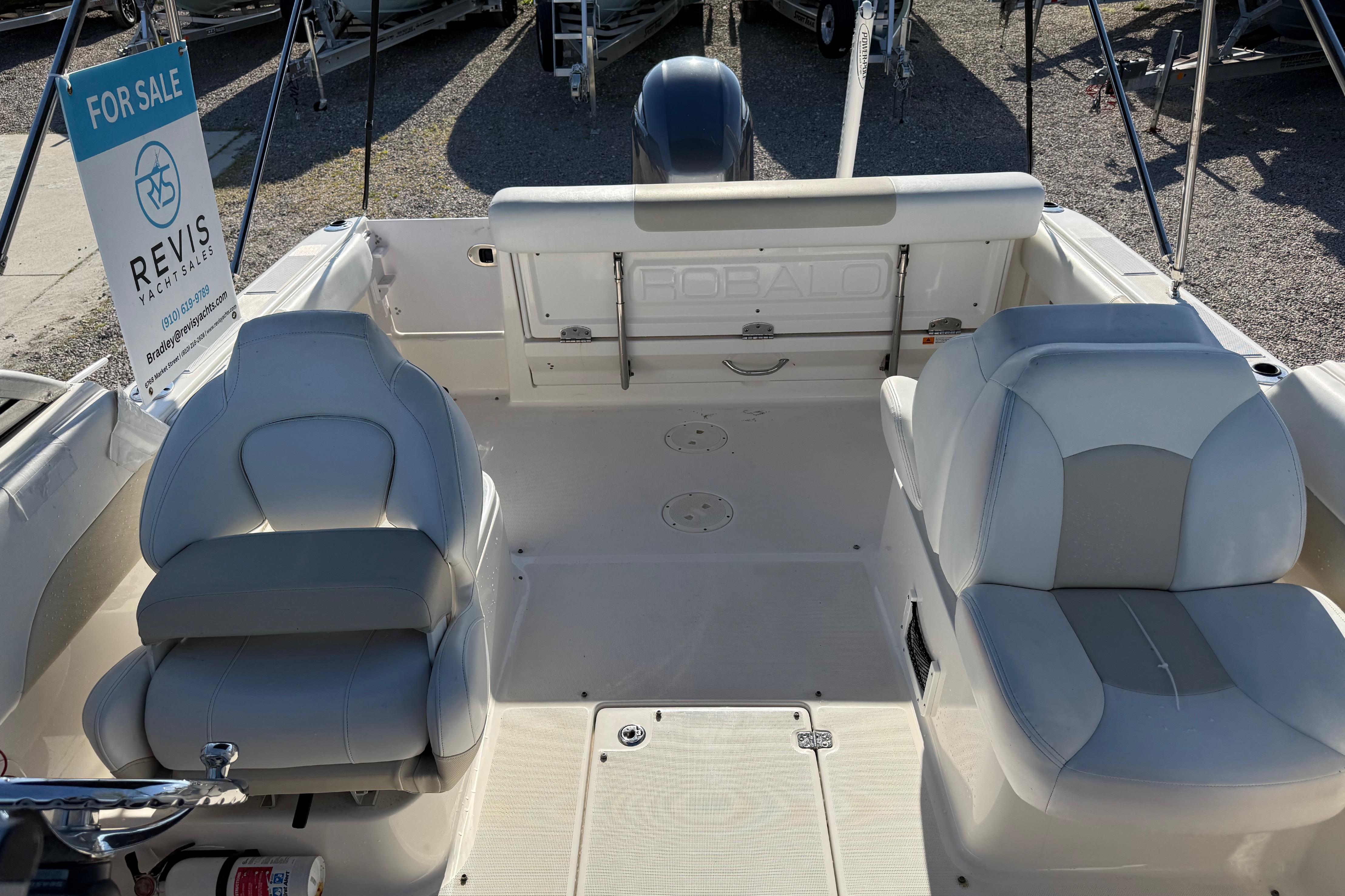 2015 Robalo R227 Dual Console boat interior with seating, for sale by Revis Yacht Sales.