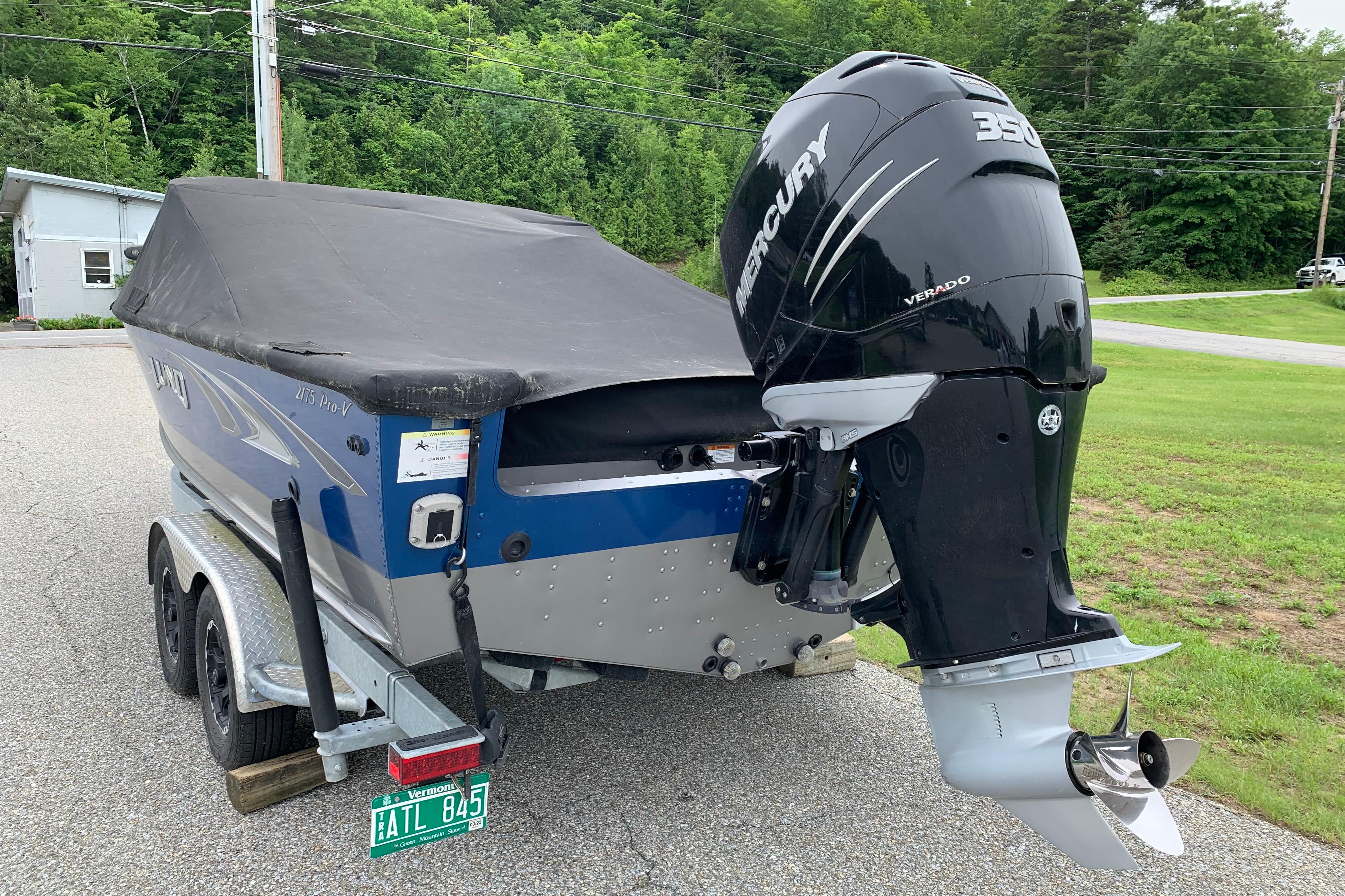 2019 Lund 2175 Pro-V boat with Mercury 350 Verado engine on trailer.