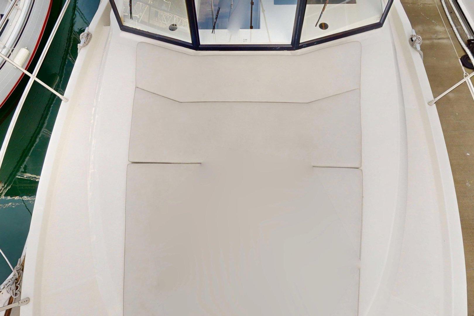 2021 Beneteau Swift Trawler 35 deck with cushioned seating area.