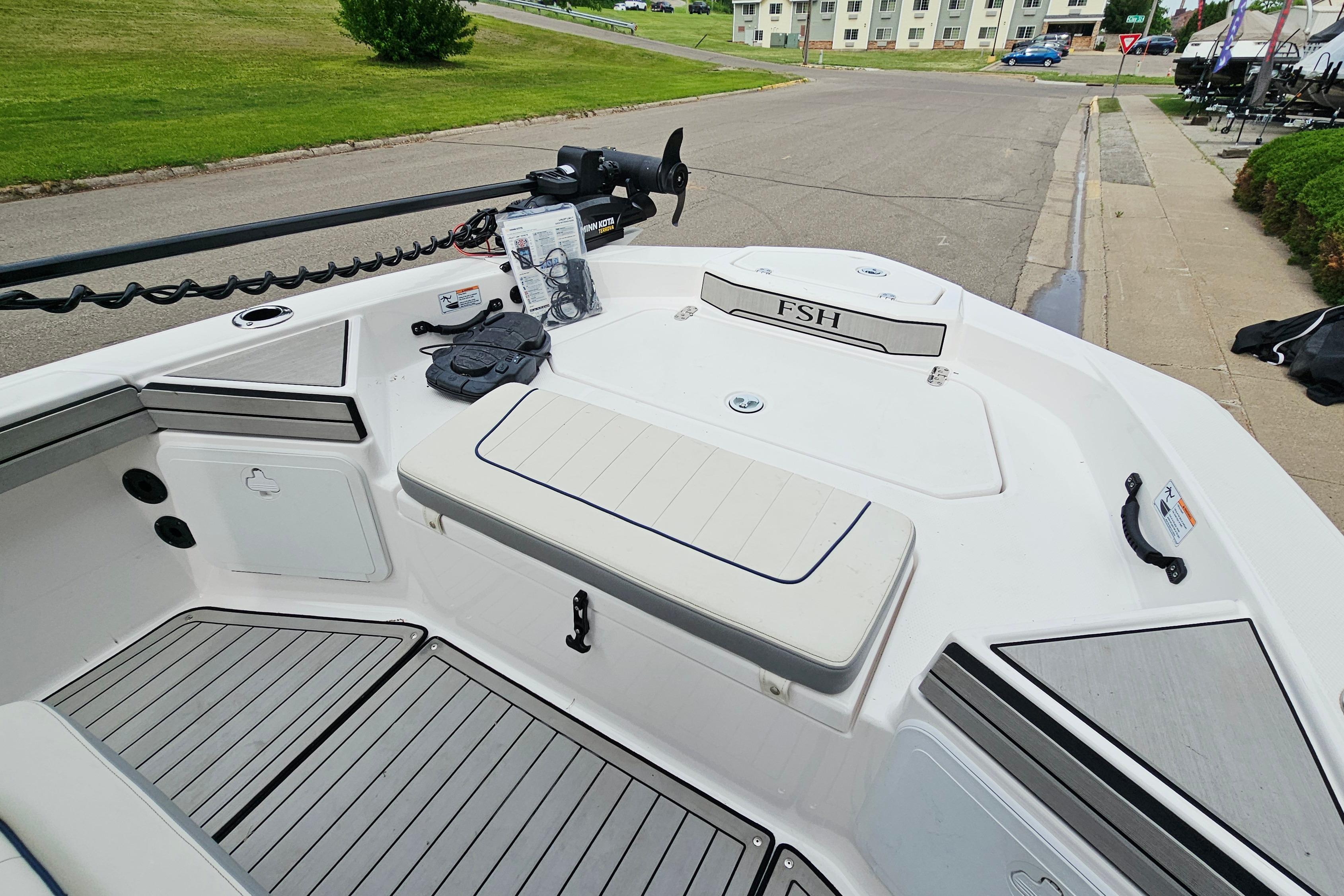 2020 Yamaha Boats 195 FSH Sport interior, featuring sleek seating and modern design elements.