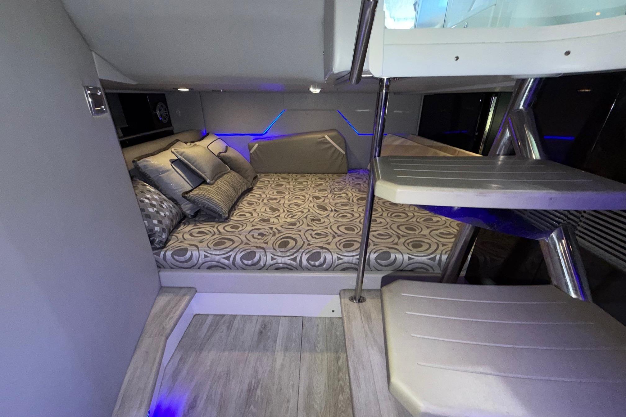 2017 Formula 430 Super Sport Crossover cabin with modern interior and stylish bedding.