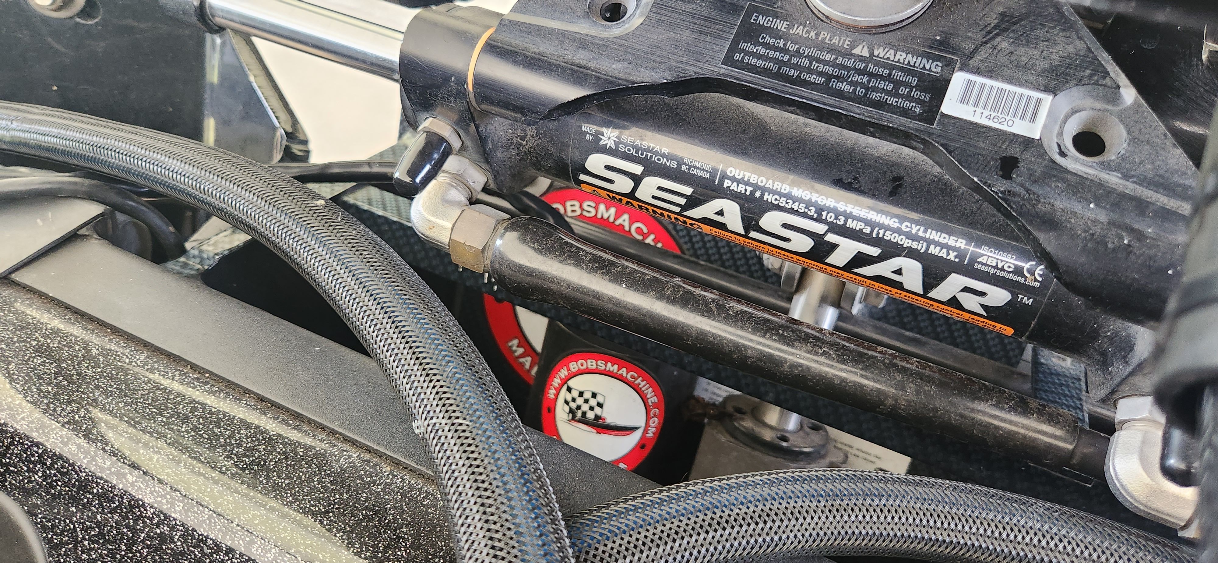 Close-up of a boat engine with Seastar hydraulic system.