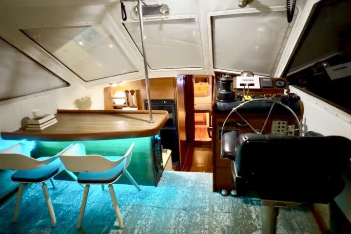 Interior of 1982 Lancer 45 Motorsailer with modern seating and navigation equipment.