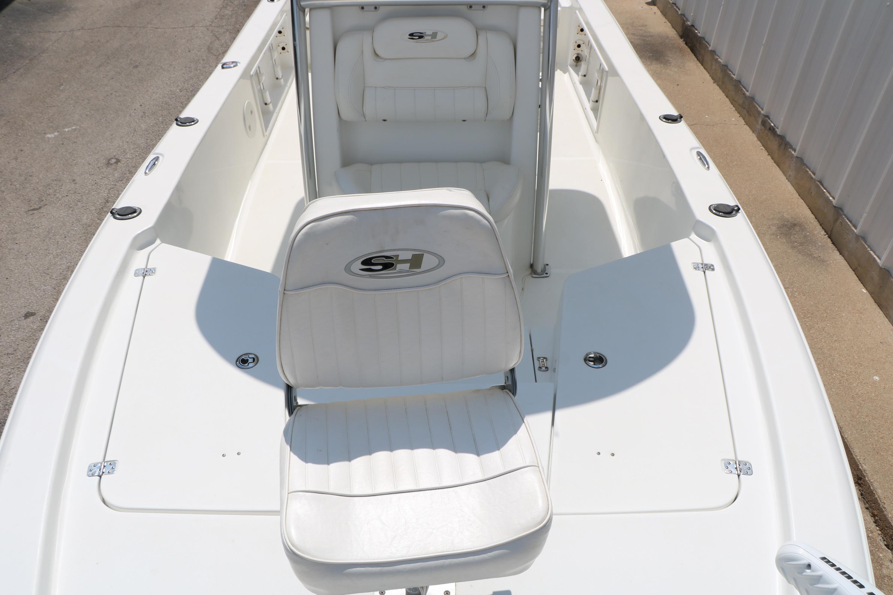 2015 Sea Hunt BX 22 BR boat interior with white seating and spacious deck.
