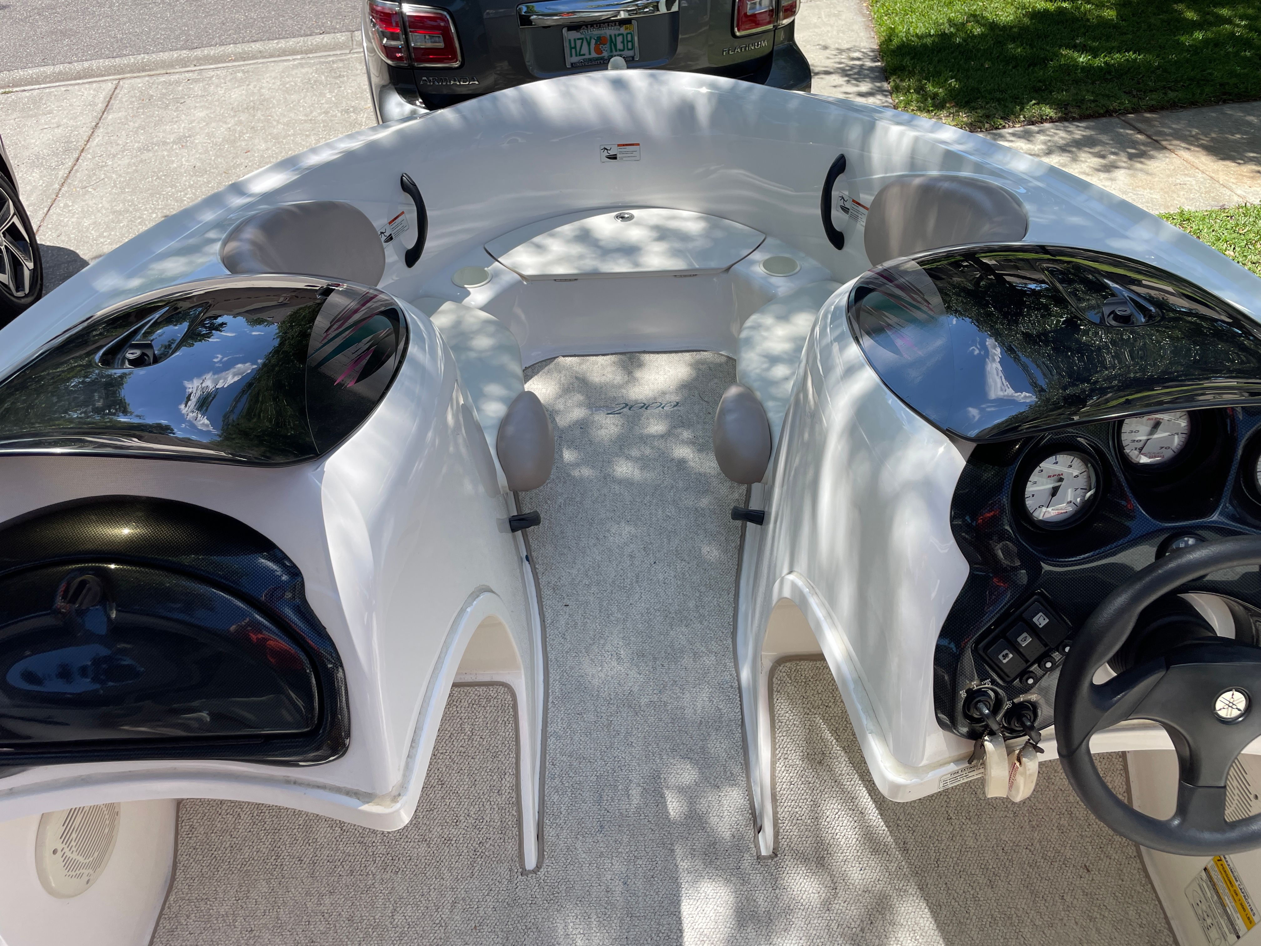 Interior of a 2000 Yamaha LS2000 boat with steering console.
